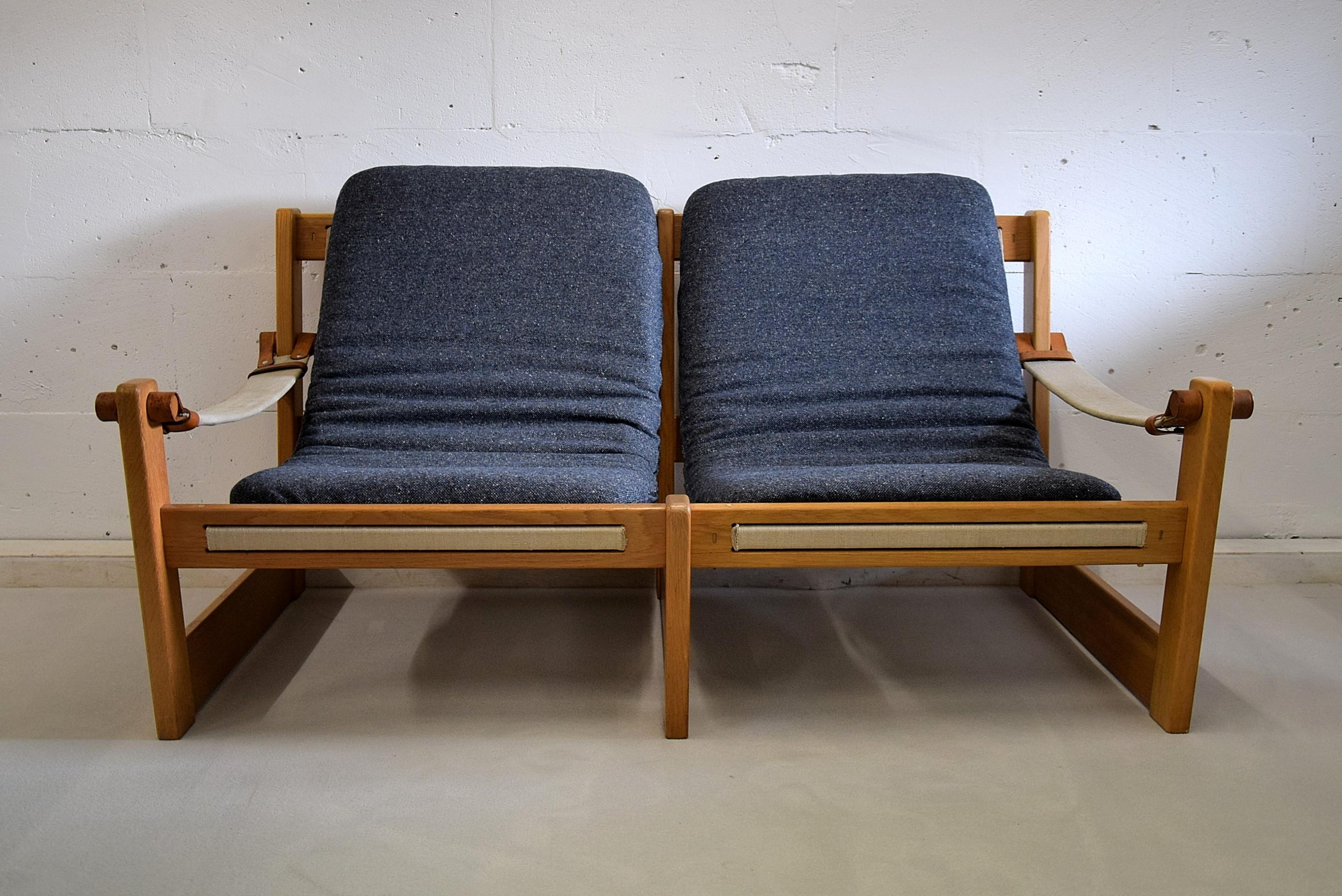 Scandinavian lounge set Mid-Century Modern by Yngve Ekström
Stylish and rare 1960s oak lounge set. This set consists of one chair, a two-seat and a table.
The furniture is made of oak, canvas, leather and upholstered cushions.

Measurements :