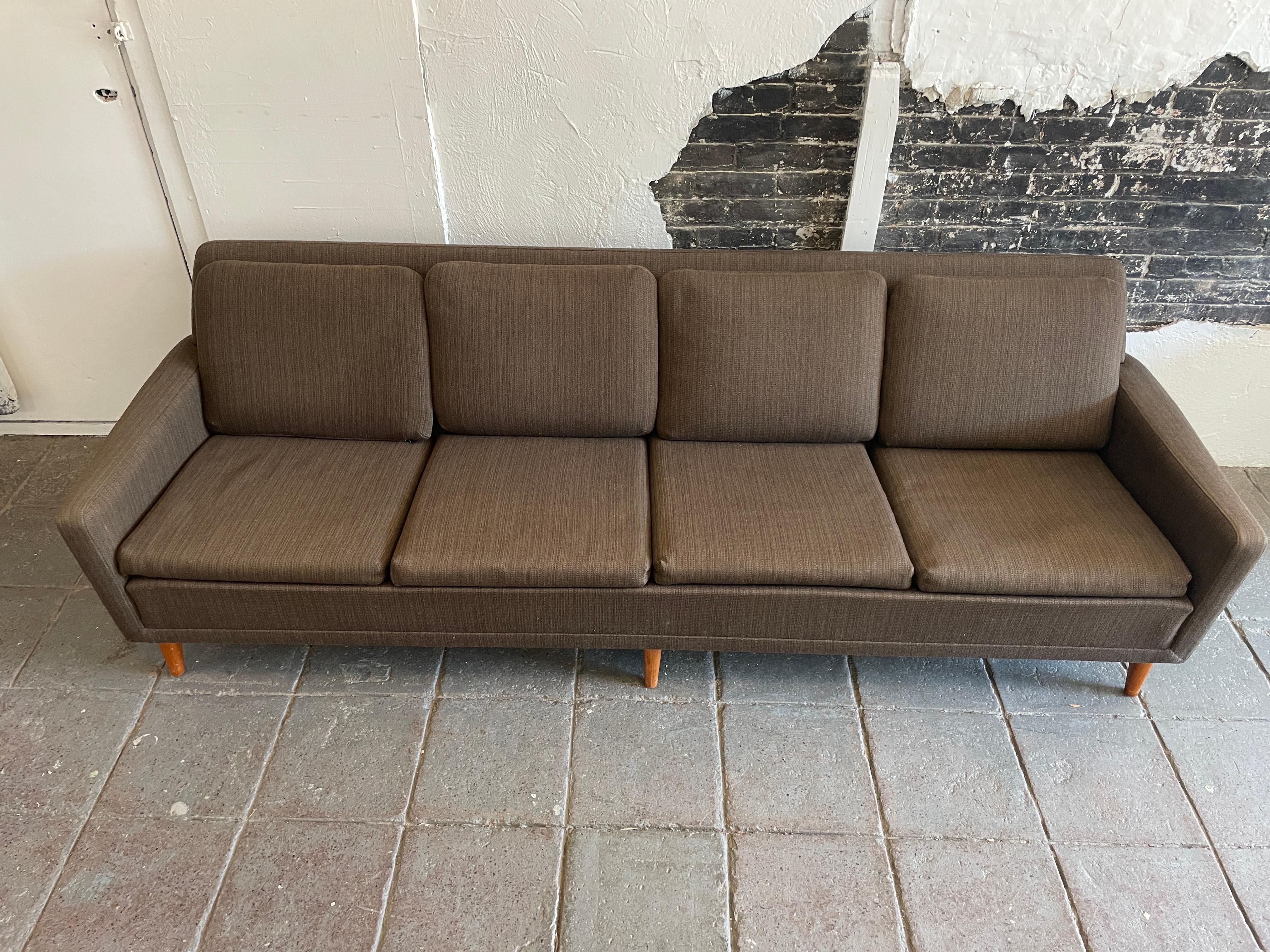 Mid-century Scandinavian Modern low 4 seat low sofa couch by DUX in original Dark Brown woven wool upholstery with solid teak legs. All Original 1960's Upholstery in beautiful condition. Wonderful design and very comfortable. Shows very little wear
