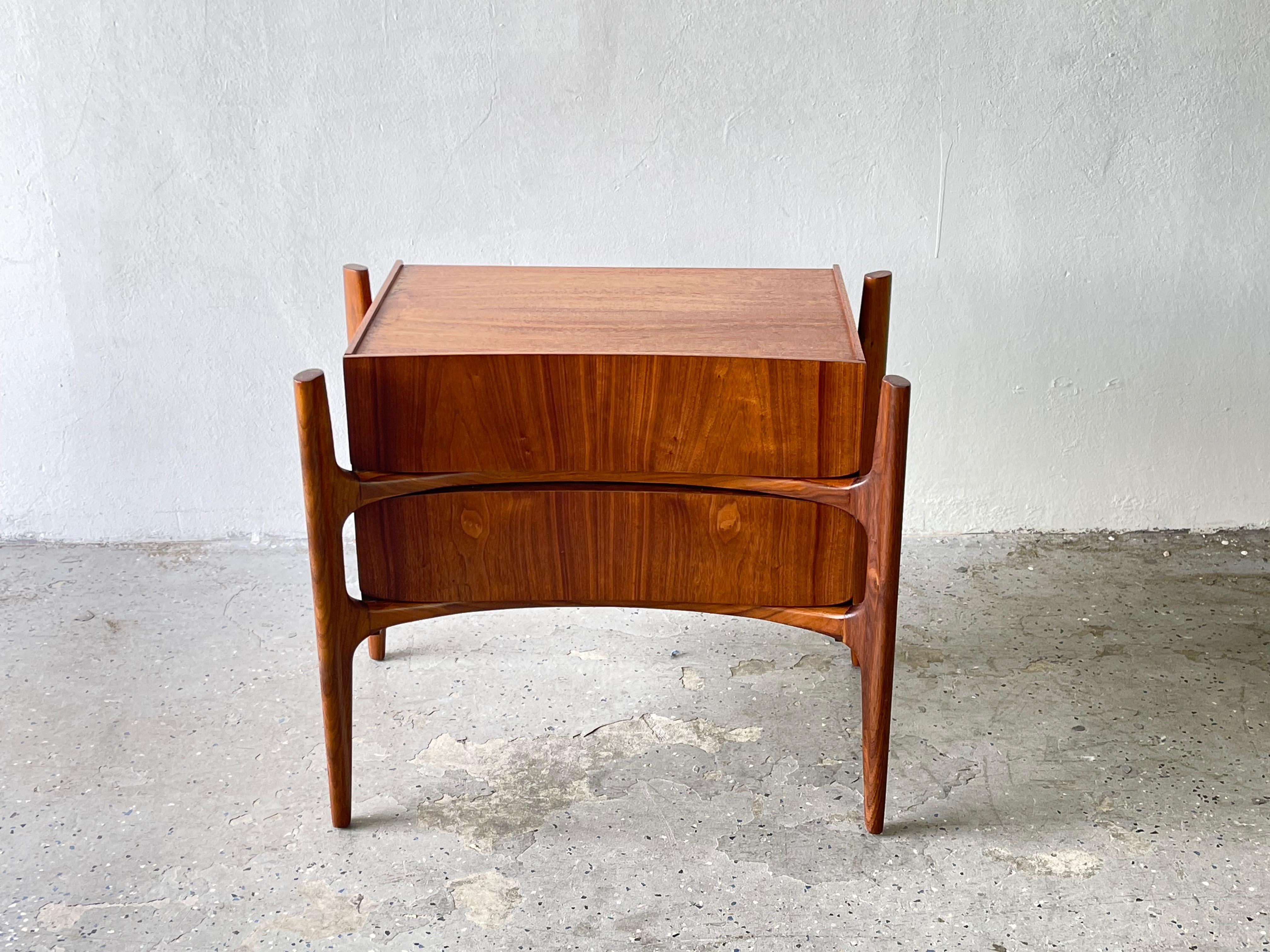 Magnificently rare Scandinavian masterpieces - William Hinn Nightstands by Urban Furniture Co. for the Swedish Guild Collection. It is a marvel of Scandinavian construction and design. It feature an exposed biomorphic frame that intersects and