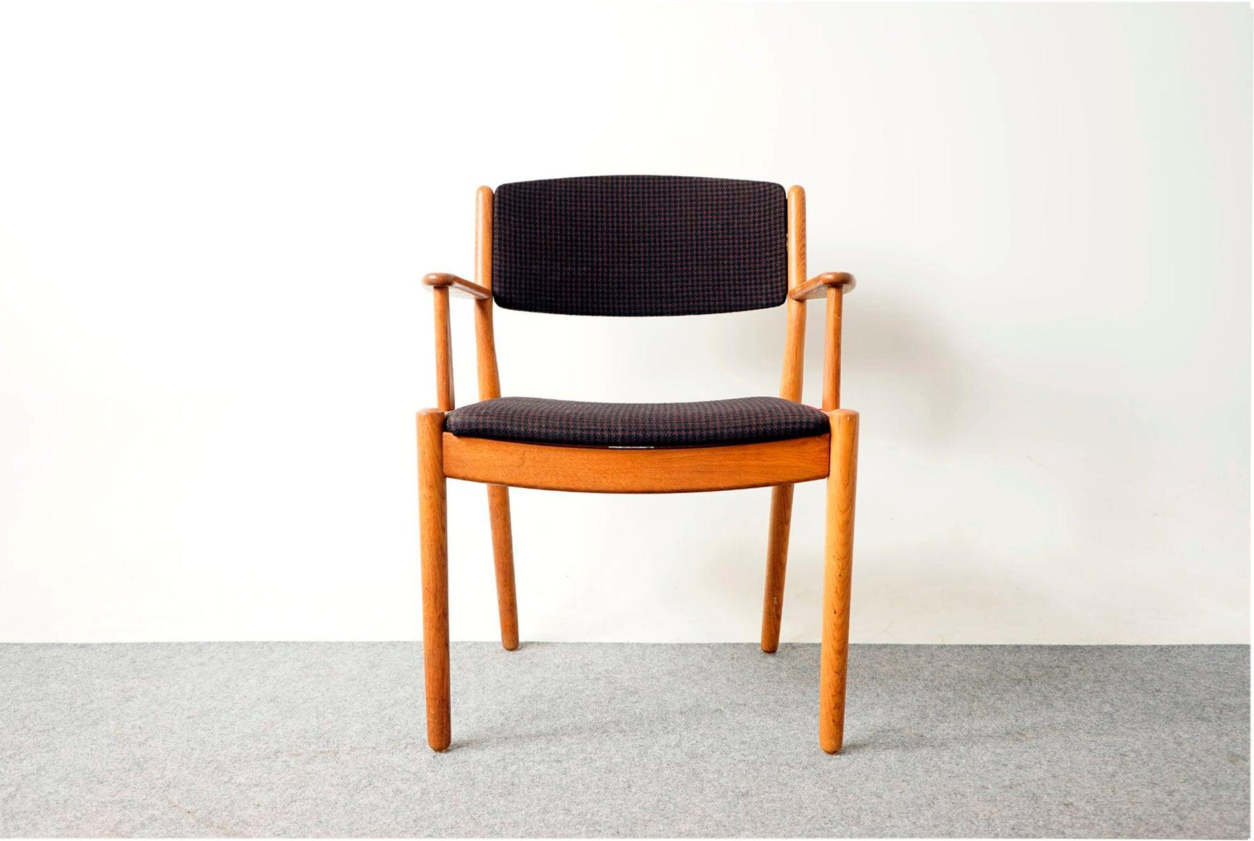 Oak Danish modern arm chair by Poul Volther for FDB, circa 1960's. Solid wood frame with upright upholstered back provides support and comfort. This beautifully sculpted frame offers comfort without an imposing footprint. Clean modern design makes