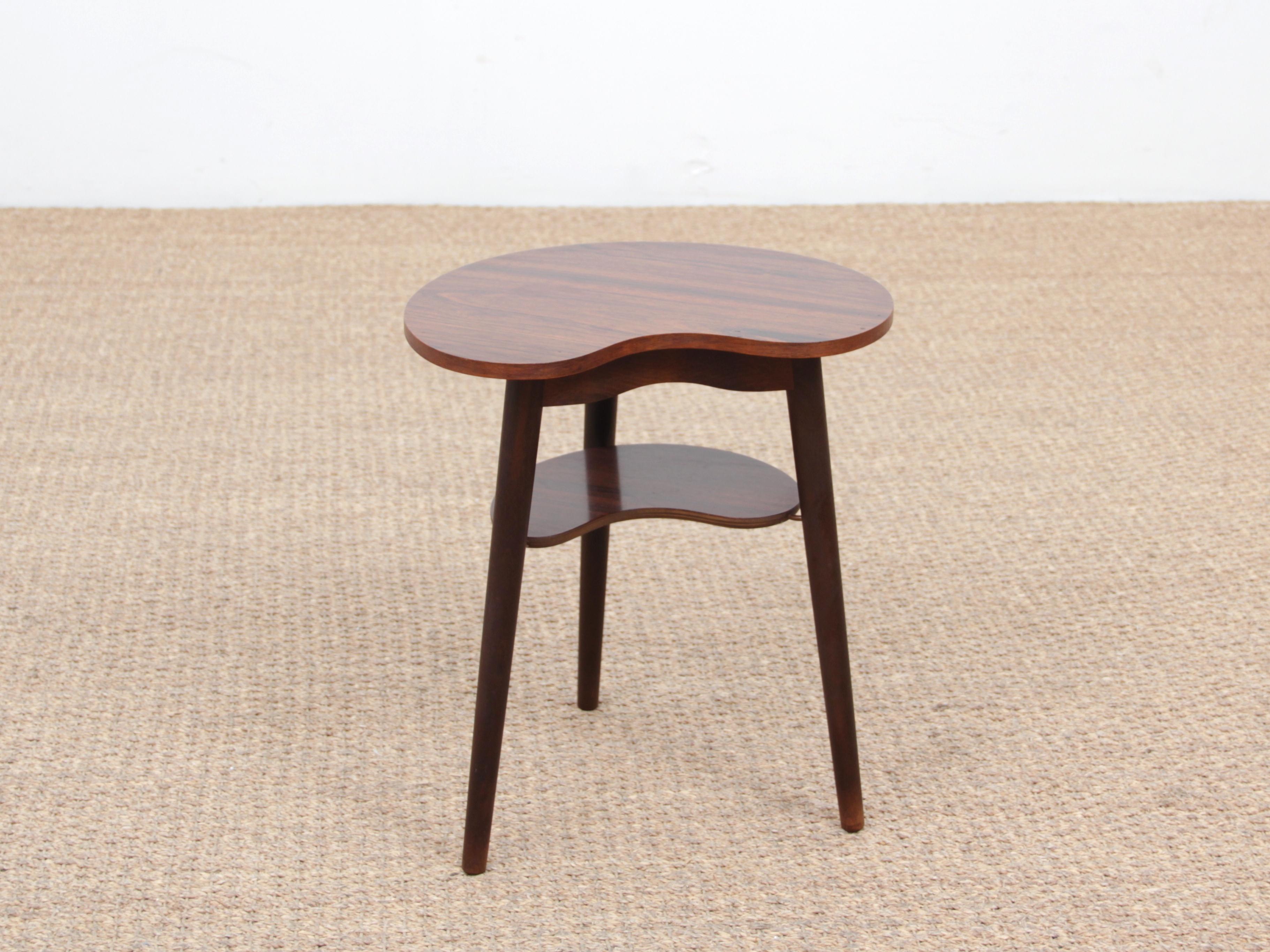 Mid-Century Modern Scandinavian occasional table in rosewood. Small hidden drawer.