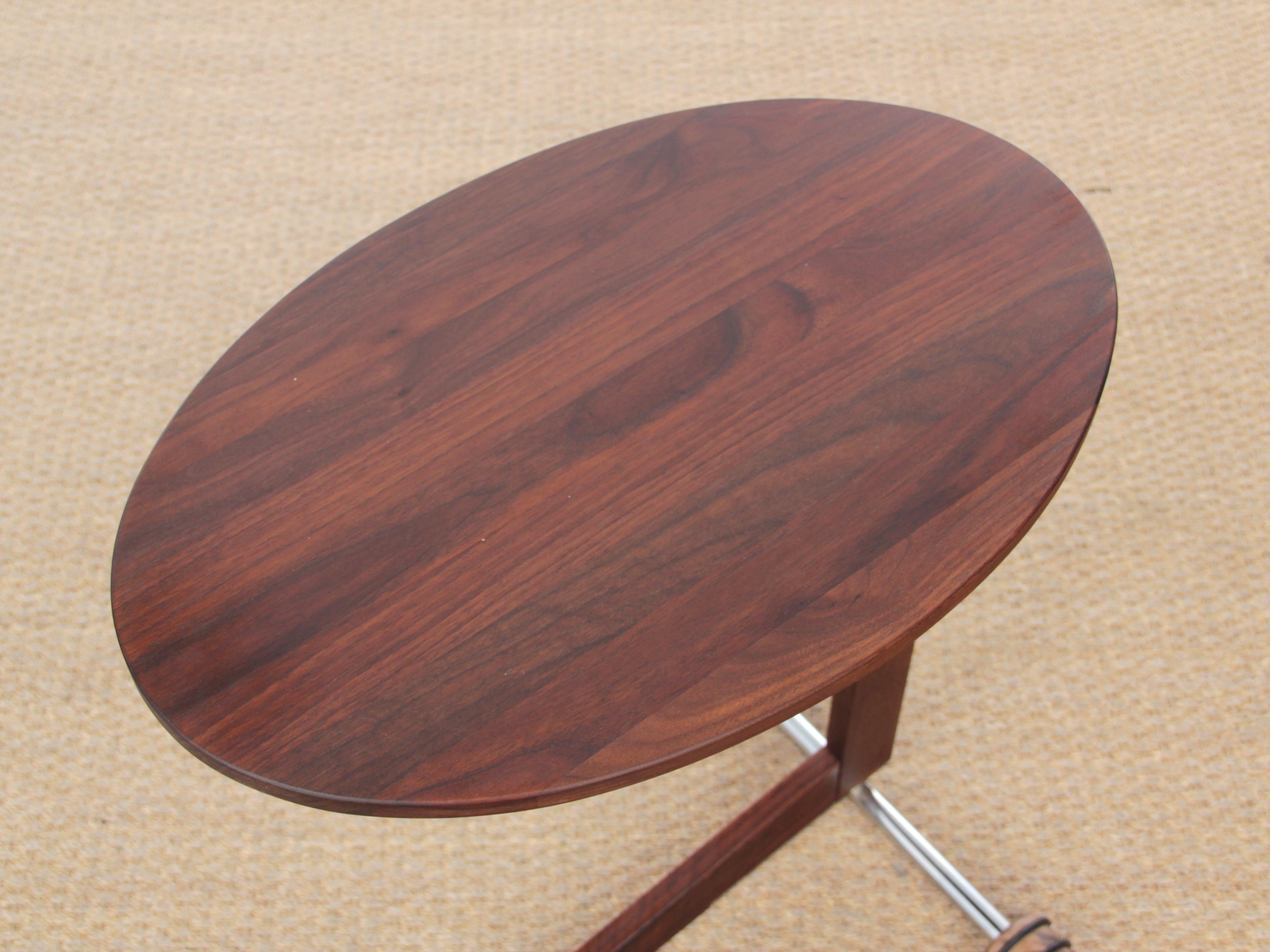 Mid-Century Modern Scandinavian occasional table in walnut. Production from the 2000s.