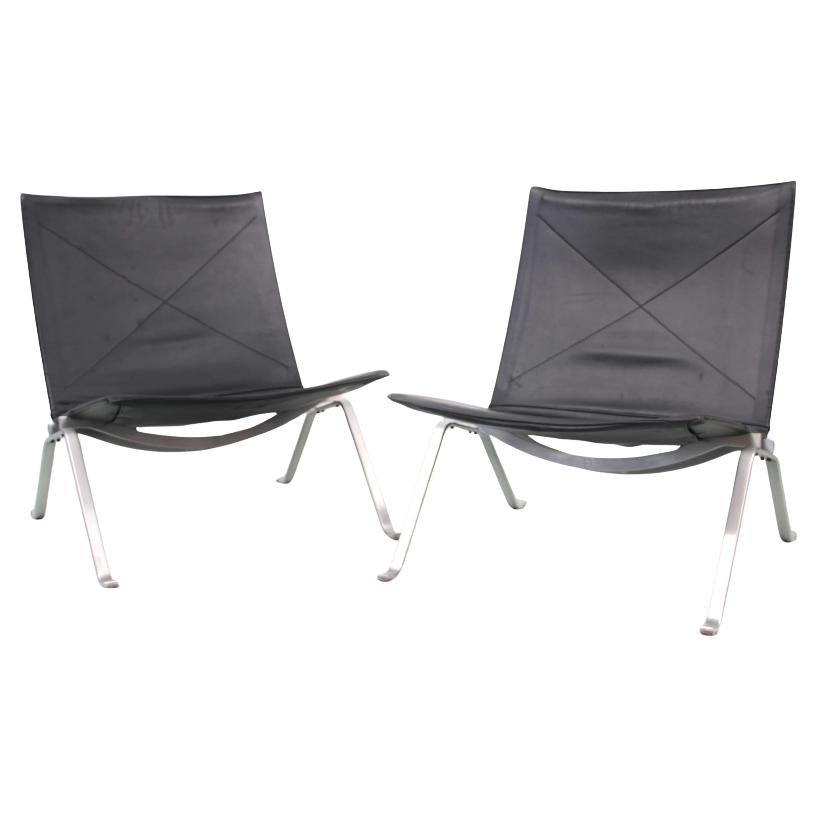 Coppia di PK 22 di Poul Kjaerholm, in stile scandinavo, risalente alla metà del secolo.