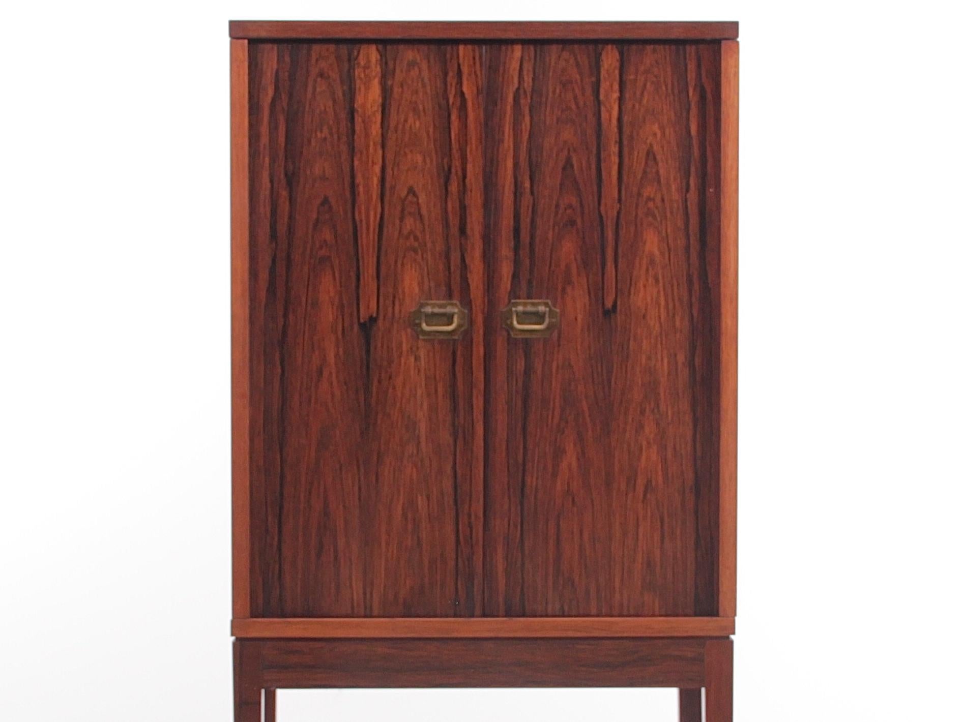 Mid-Century Modern rosewood pipe cabinet by Ole Wansher.


 
