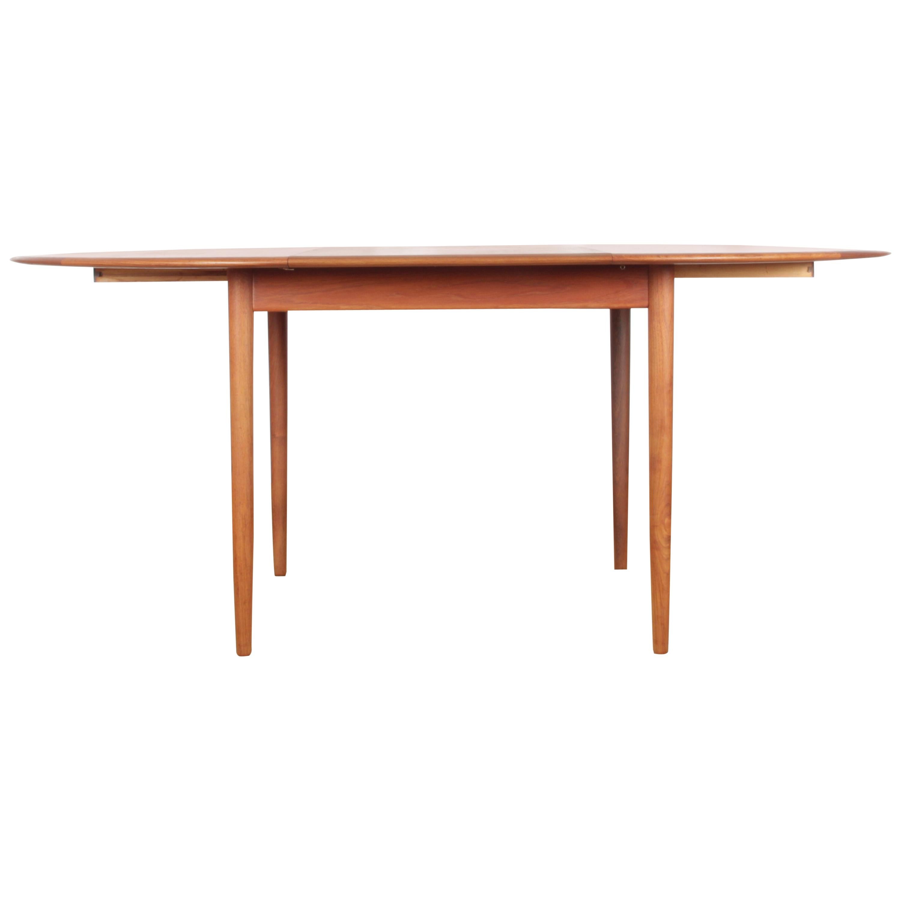 Skandinavisches rundes Mid-Century Modern-Esszimmer aus Teakholz mit 4/8 Sitzen von Hovmand-Ols im Angebot
