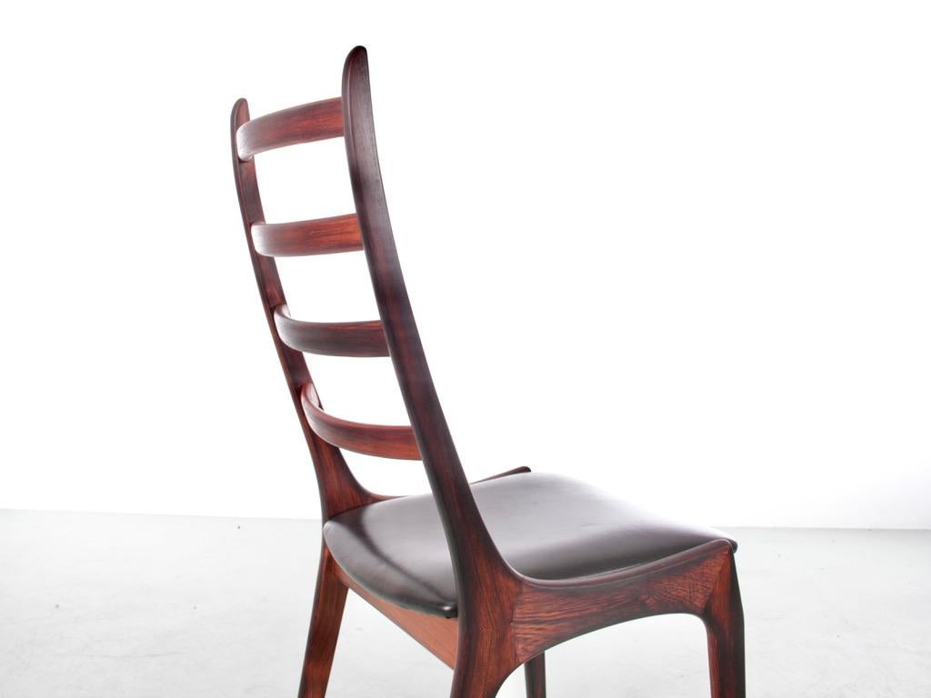 Leather Mid-Century Modern Scandinavian Set of 4 Rosewood Chairs by Henning Kjærnulf For Sale
