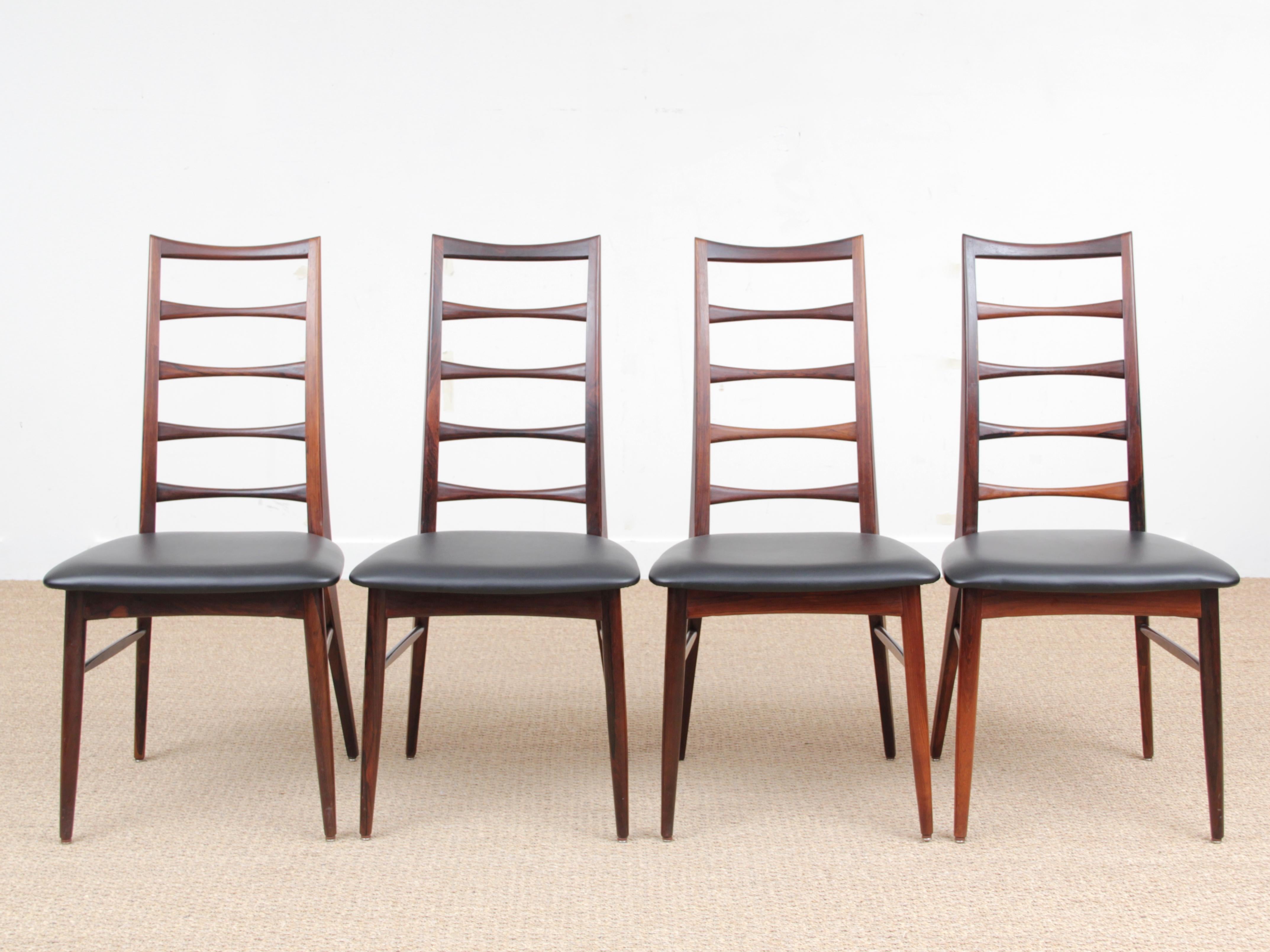 Mid-Century Modern Scandinavian set of 4 rosewood chairs modele Lis by Niels Koefoed. Black leather seats newly reupholstered.


   