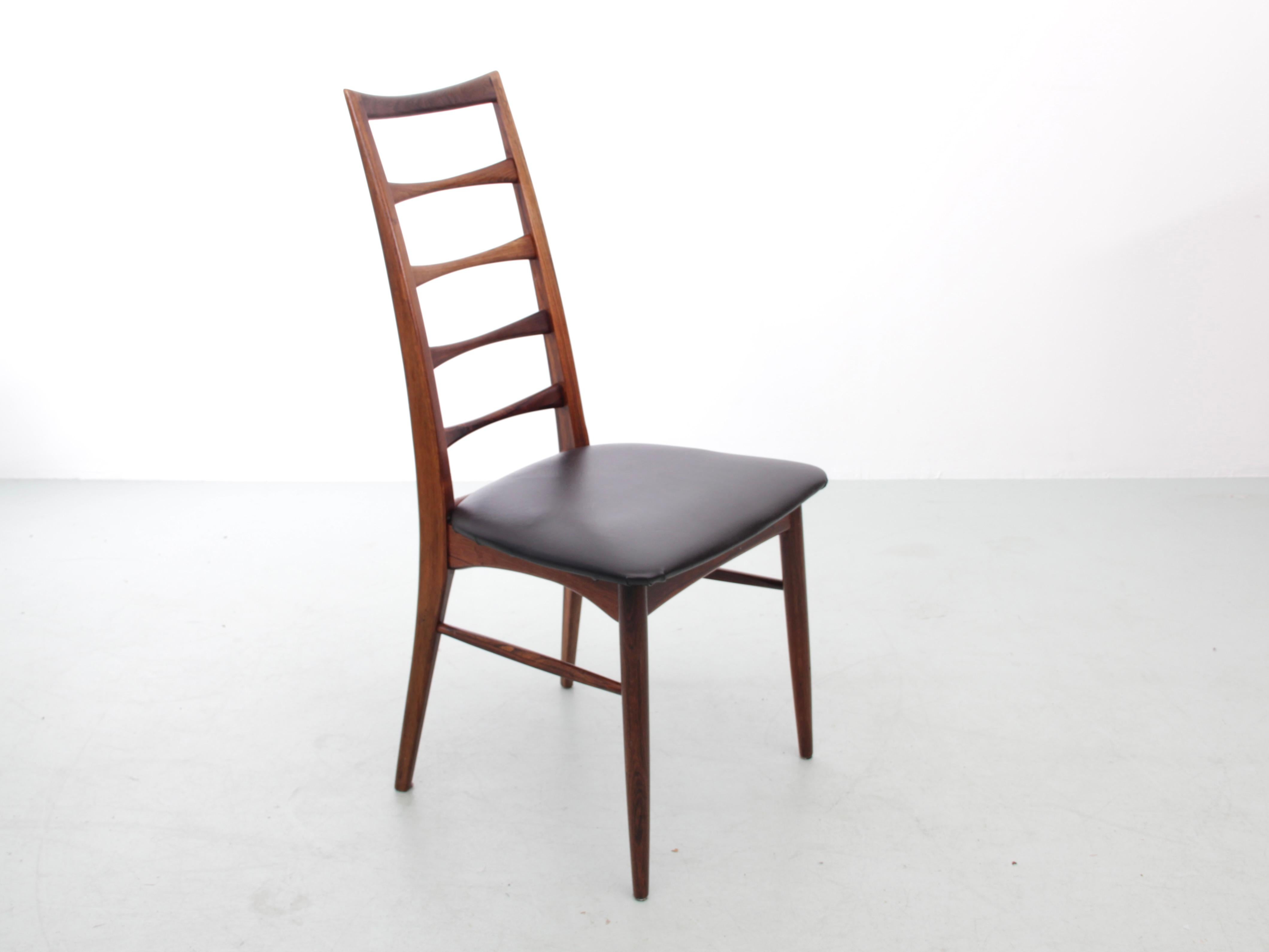 Set di 4 sedie in legno di palissandro modele Lis di Niels Koefoed. Sedili in pelle nera appena rivestiti.


   