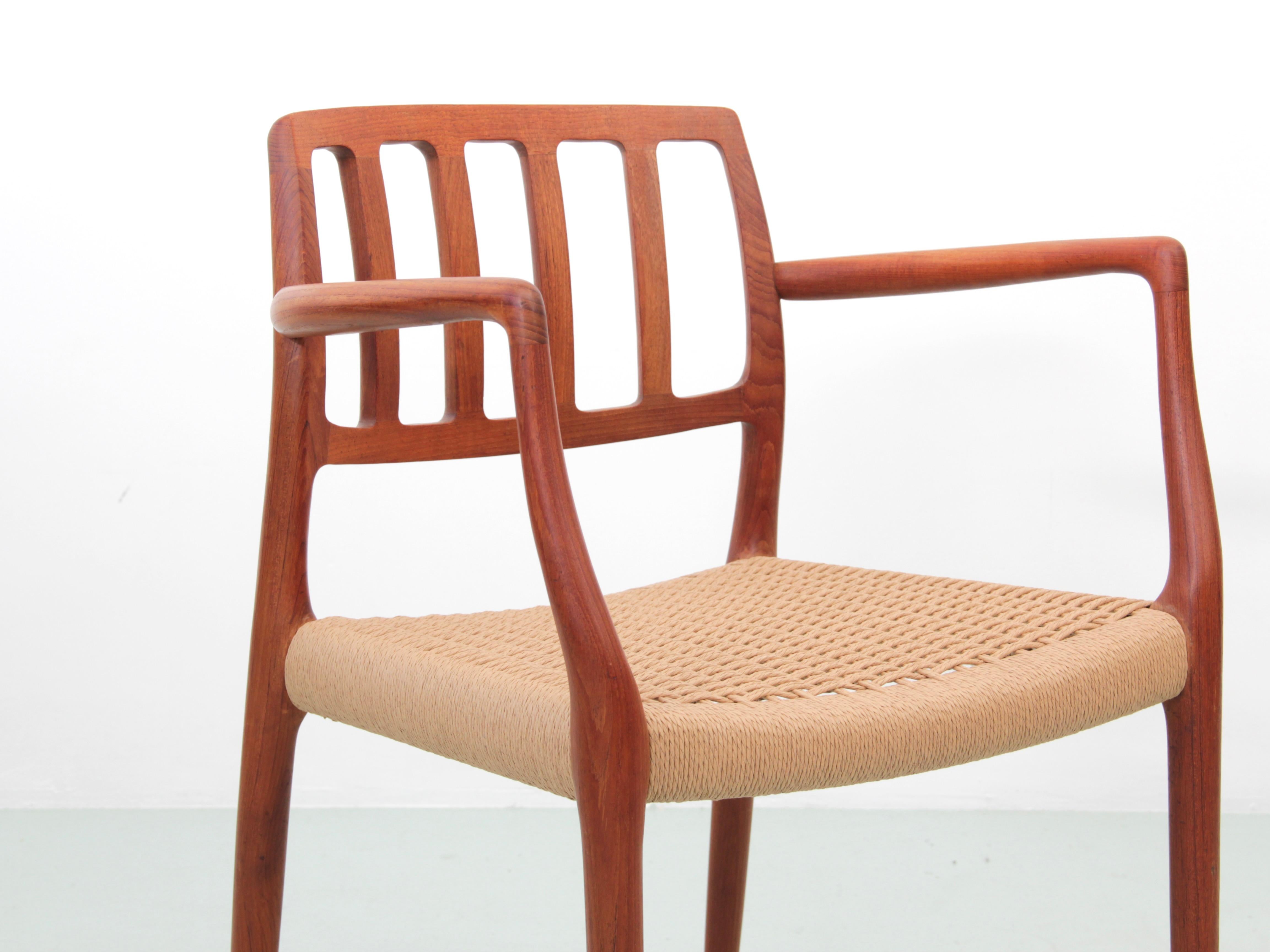 Mid-Century  modern scandinavian set of 4 teak armchairs model 66  For Sale 5