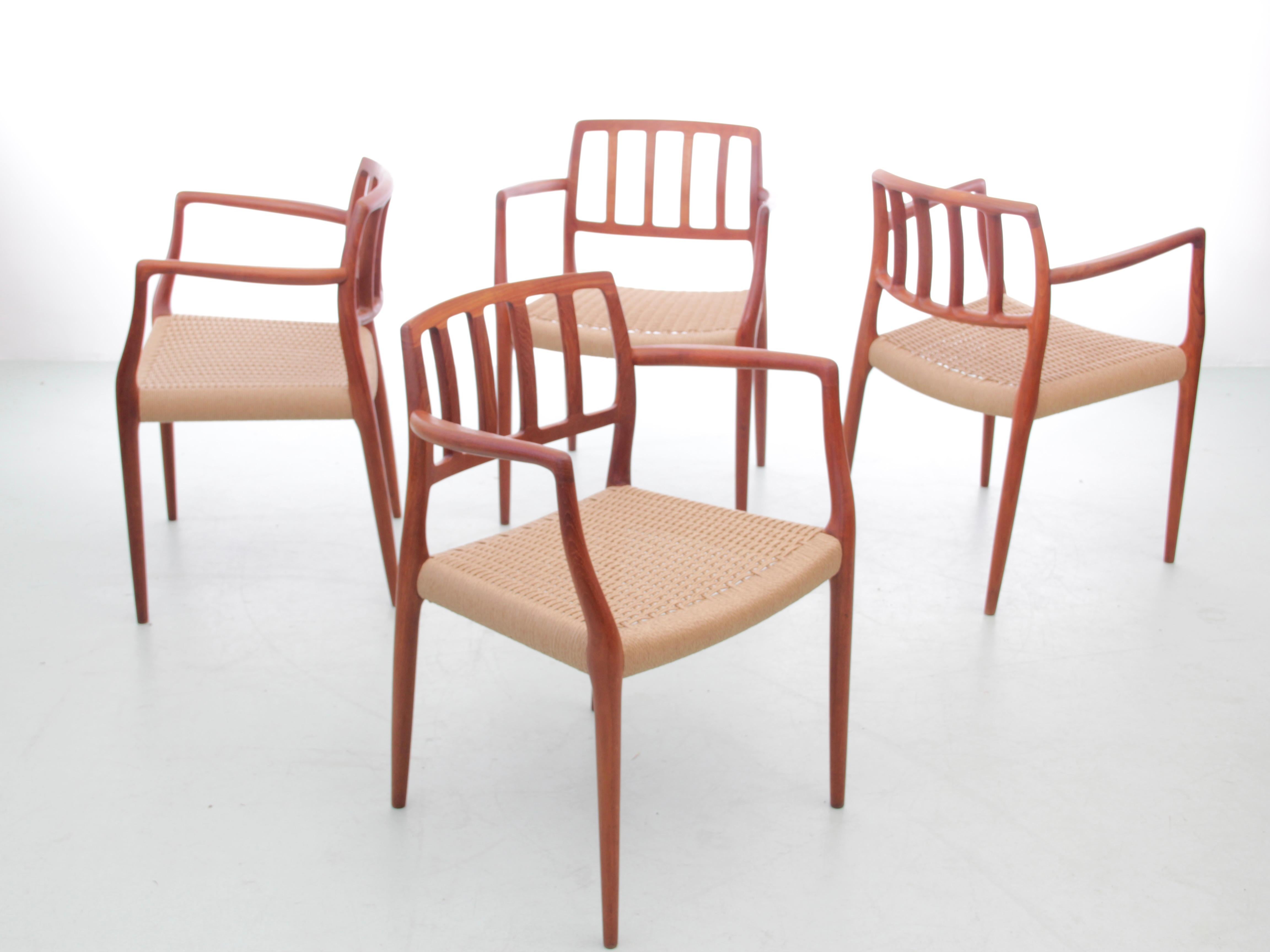 Mid-Century  modern scandinavian set of 4 teak armchairs model 66  For Sale 10