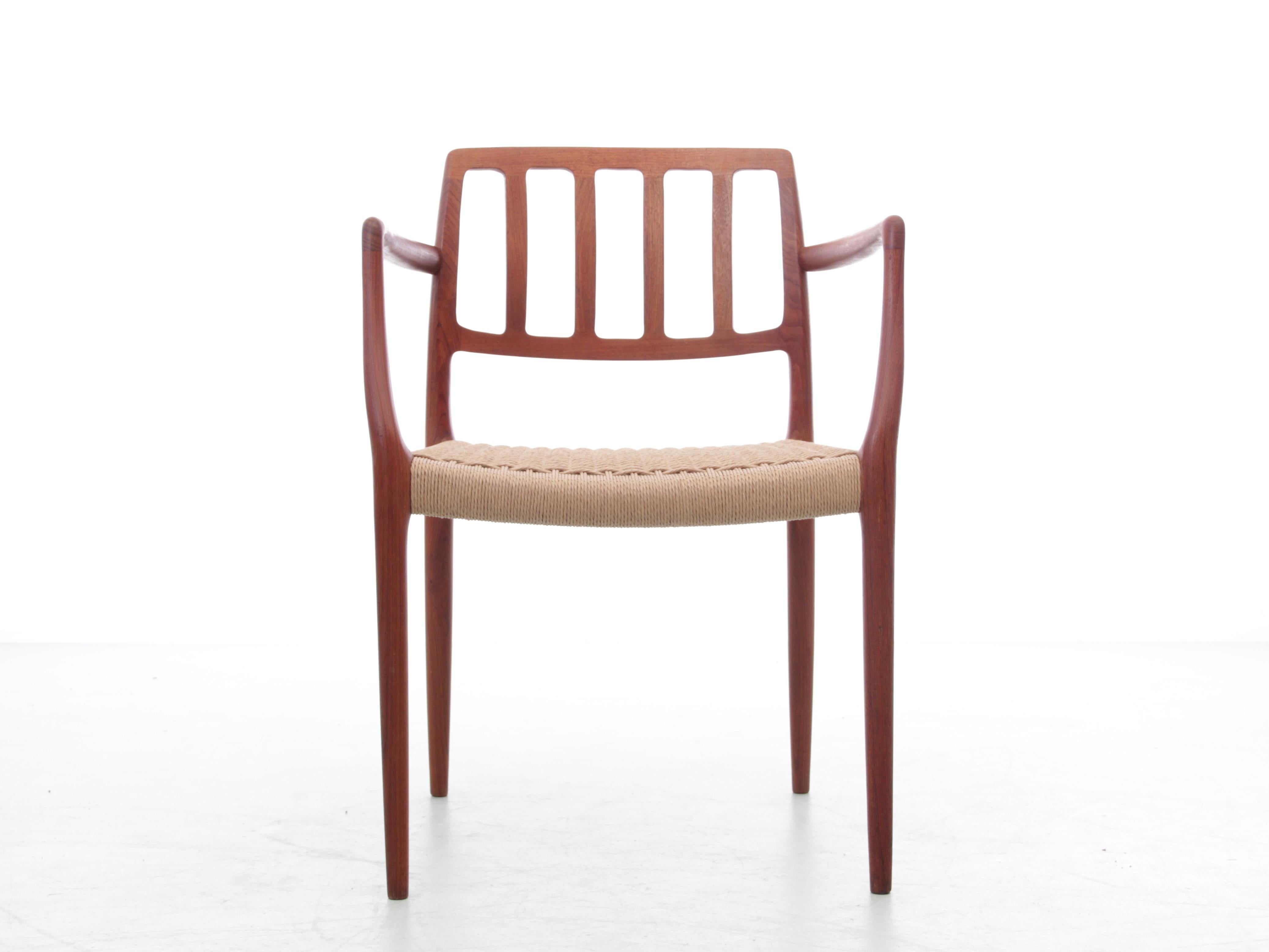 Mid-Century  modern scandinavian set of 4 teak armchairs model 66 . Danish paper cord seat newly restored
