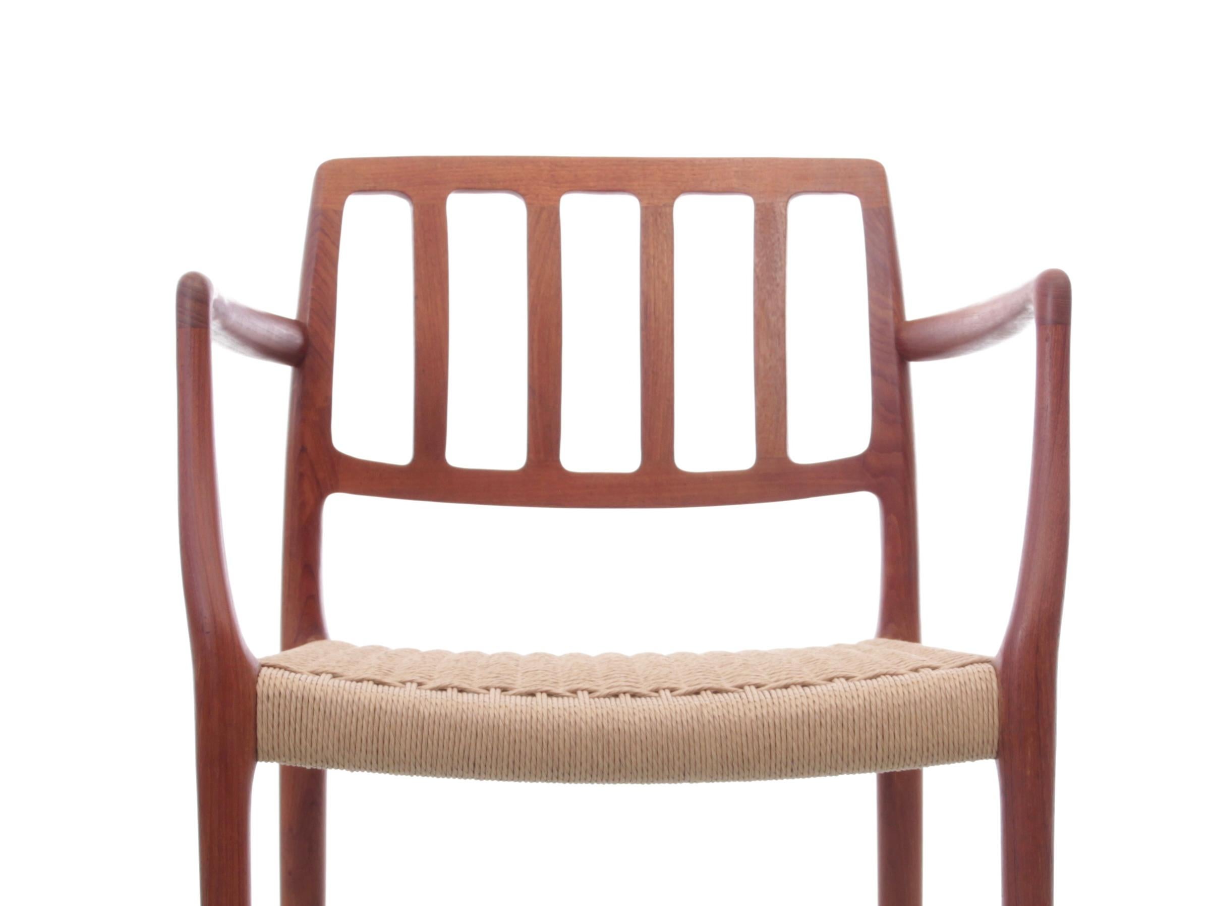Mid-Century  modern scandinavian set of 4 teak armchairs model 66  For Sale 1