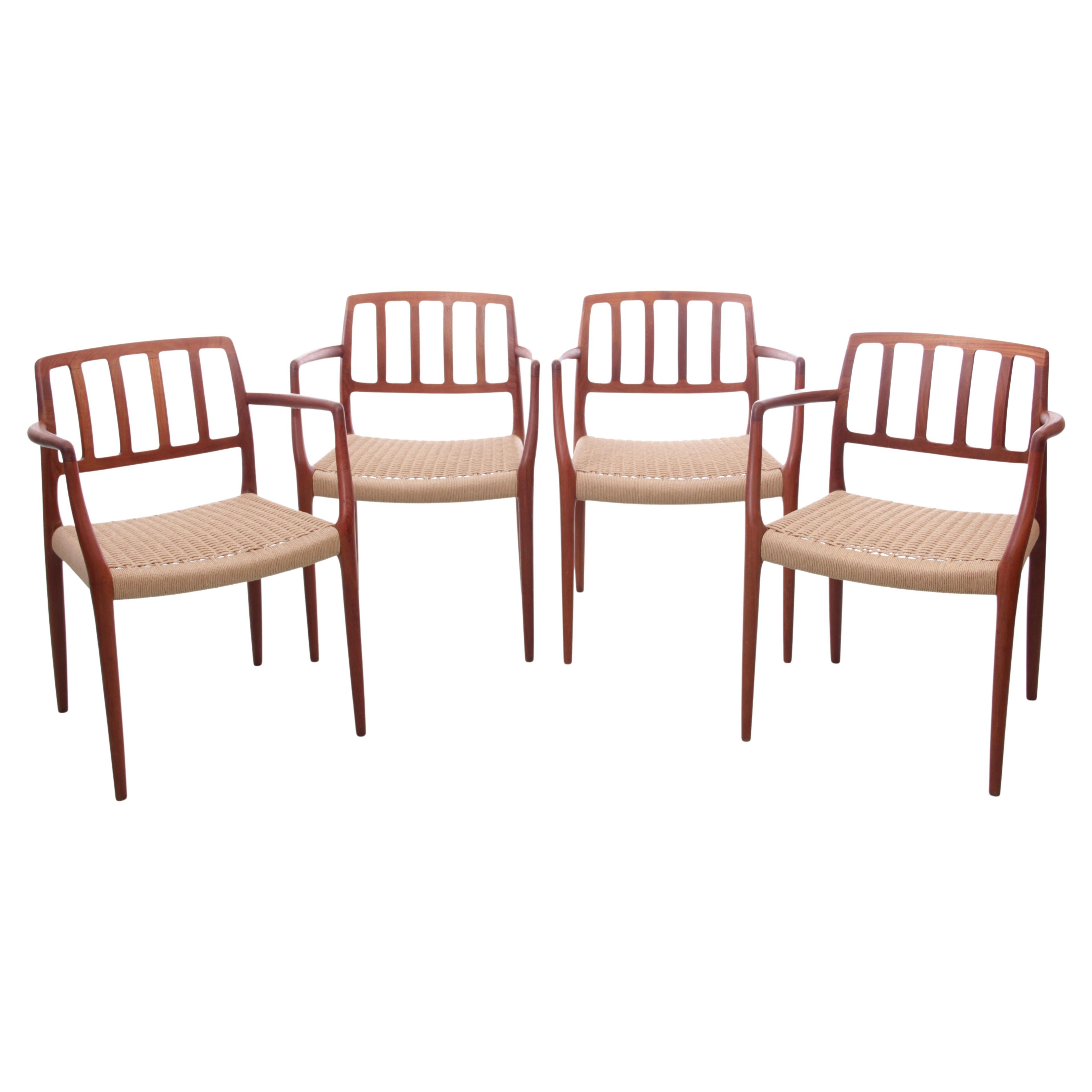 Mid-Century  modern scandinavian set of 4 teak armchairs model 66  For Sale