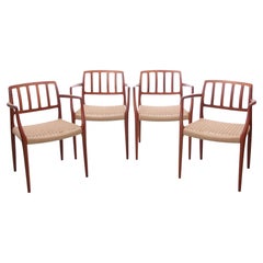 Vintage Mid-Century  modern scandinavian set of 4 teak armchairs model 66 