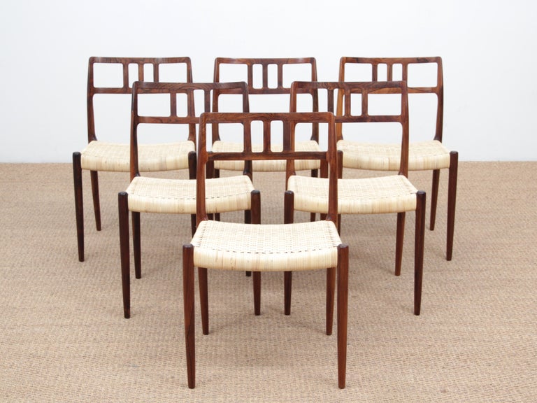 Mid-Century Modern Scandinavian set of 6 chairs by Niel Møller in rosewood. New cane seats.