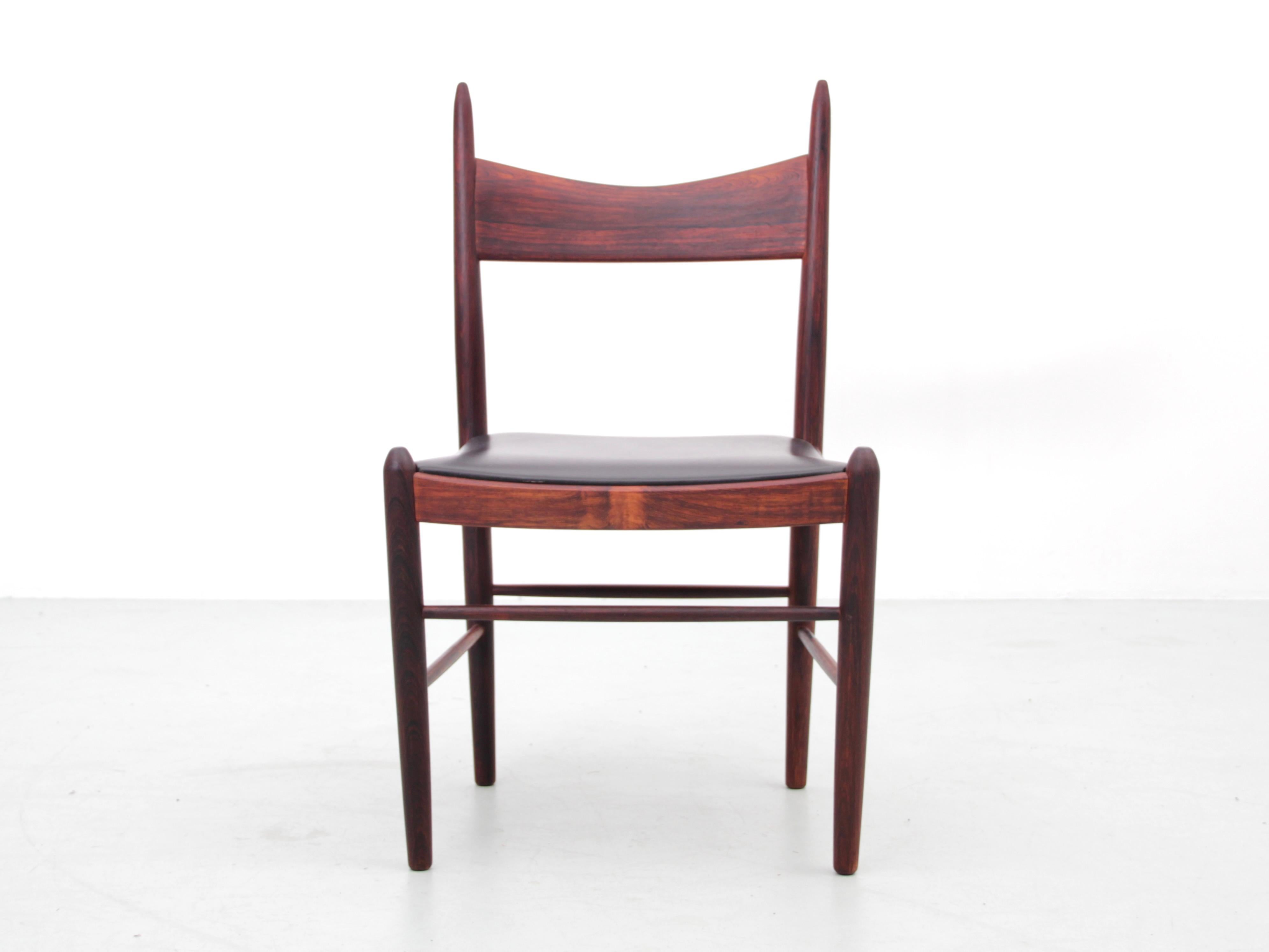 Mid-Century Modern set of 4 dining chairs in Rio rosewood by H. Vestervig Eriksen. Original cognac leather seat.