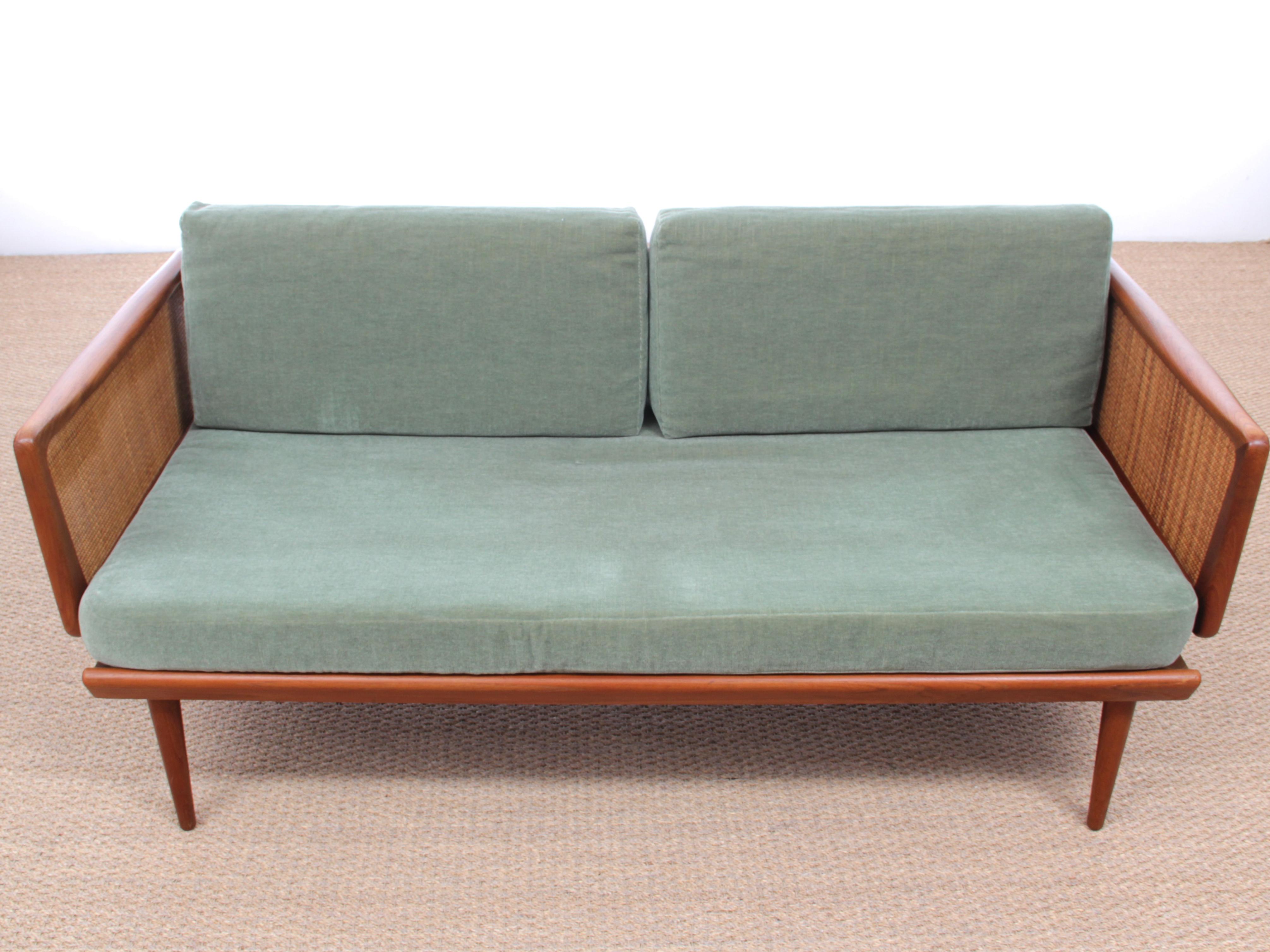 Mid-Century Modern Scandinavian sofa 2 seats FD451 by Peter Hvidty & Orla Mølgaard Nielsen for France and Søn. Teak and canne. Original cover in green velvet. Excellent condition. Referenced by the Design Museum Denmark under number RP15815.