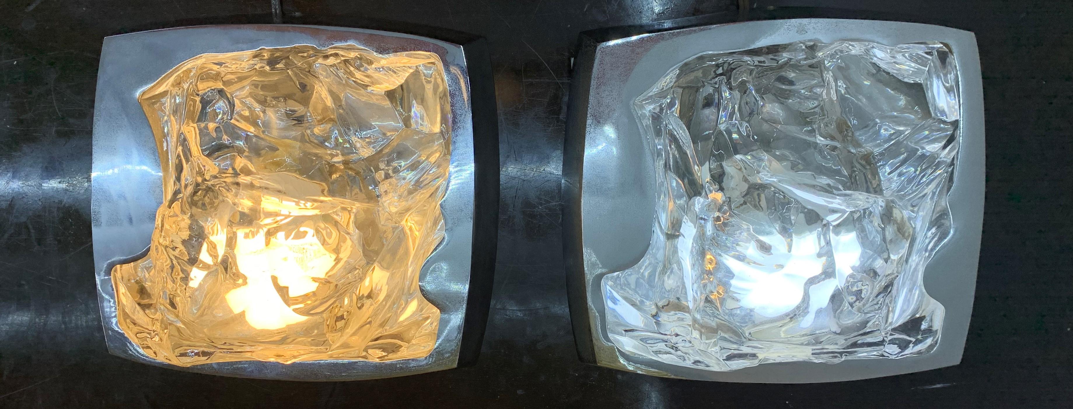 Pair of Mid-Century Modern sconces by Hillebrand, Germany in chromed brass and heavy pressed glass resembling ice.
West Germany, circa 1970, copper.