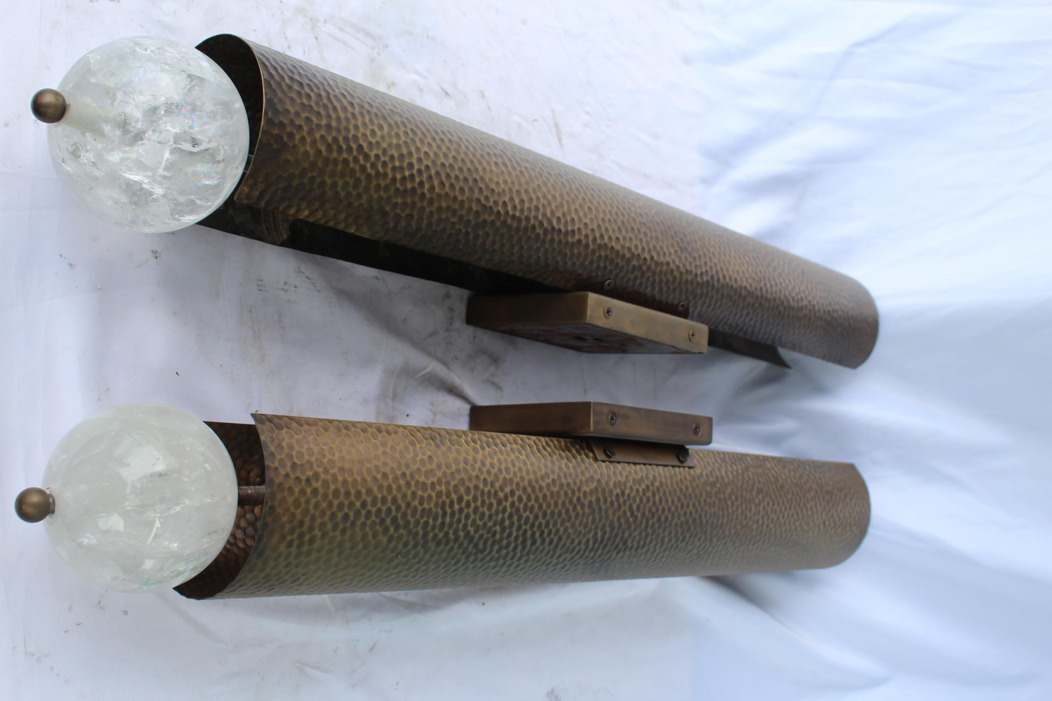 Good size pair of sconces custom made of hammered brass with antique brass patina finish. Has 3