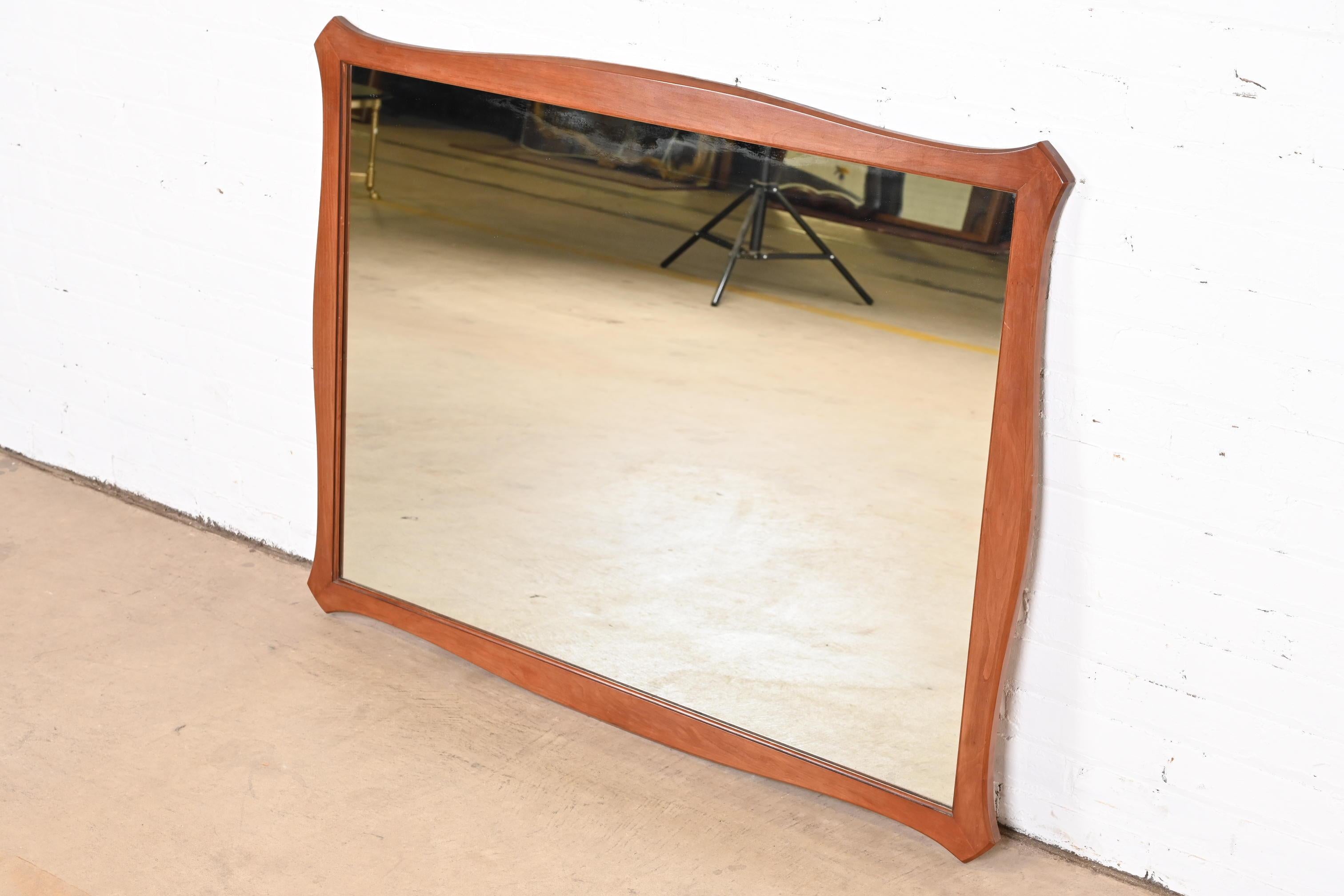 Mid-Century Modern Sculpted Cherry Wood Framed Wall Mirror In Good Condition In South Bend, IN