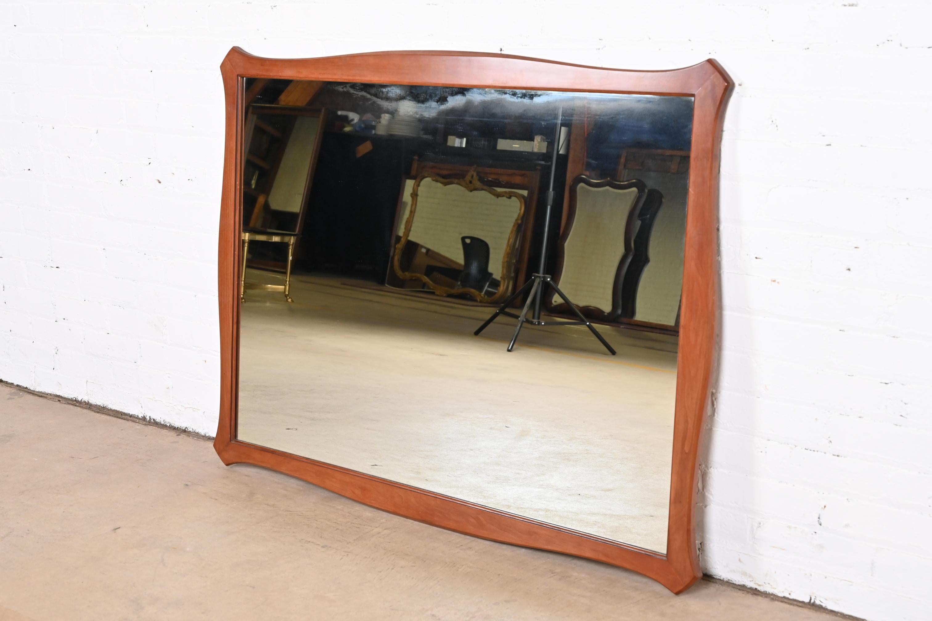 Mid-20th Century Mid-Century Modern Sculpted Cherry Wood Framed Wall Mirror