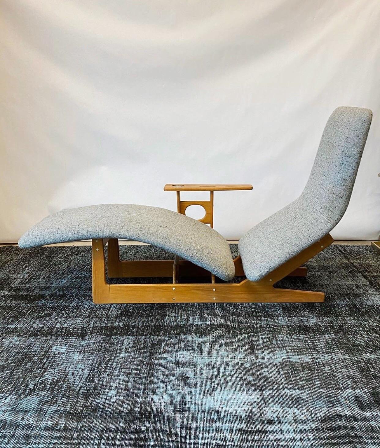 This mid century modern sculpted oak chaise lounge chair is in overall good condition and wear consistent with age and use.  This unique chaise lounge chair was created as a design student thesis project and the designer/maker is unknown.
Oak frame.