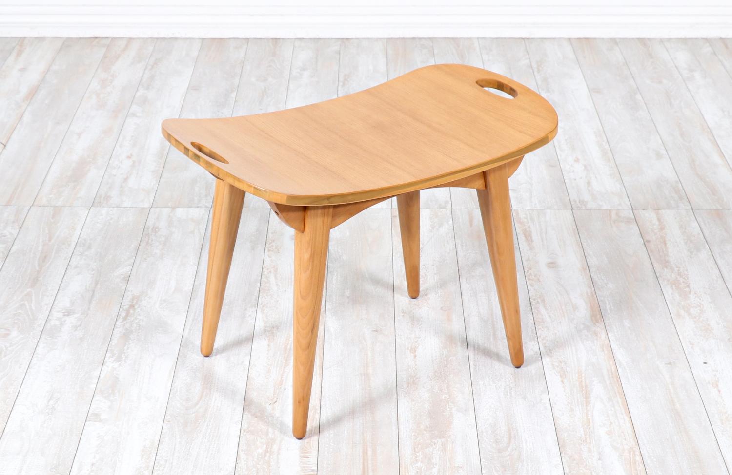 Mid-Century Modern Sculpted Primavera Wood Stool

________________________________________

Transforming a piece of Mid-Century Modern furniture is like bringing history back to life, and we take this journey with passion and precision. With over 17