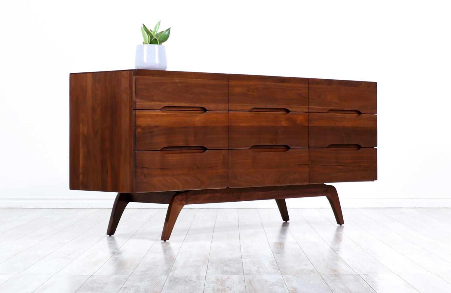 American Mid-Century Modern Sculpted Walnut 9-Drawer Dresser