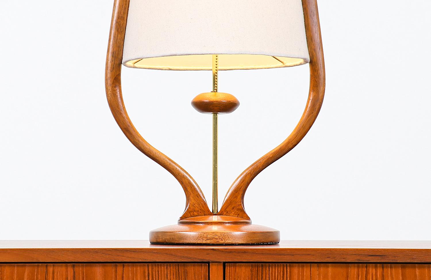 Mid-20th Century Mid-Century Modern Sculpted Walnut Arc and Brass Table Lamp by Modeline