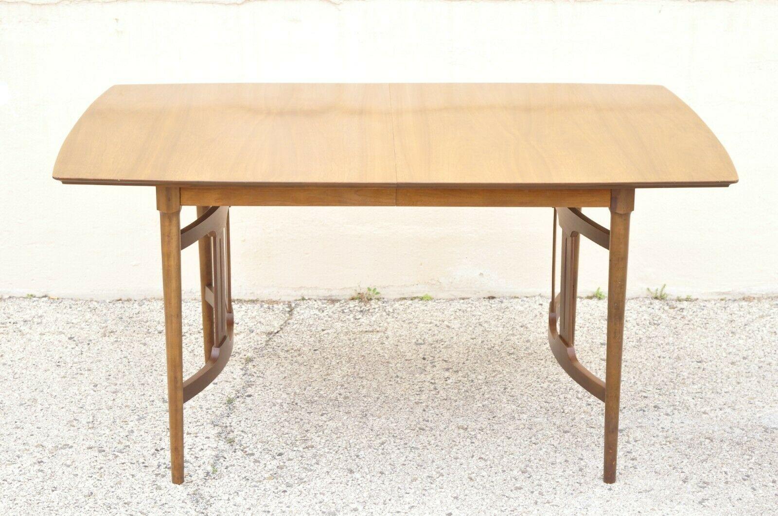 Mid Century Modern Sculpted Walnut Expanding Dining Room Table with 3 Leaves. Item features (3) 12