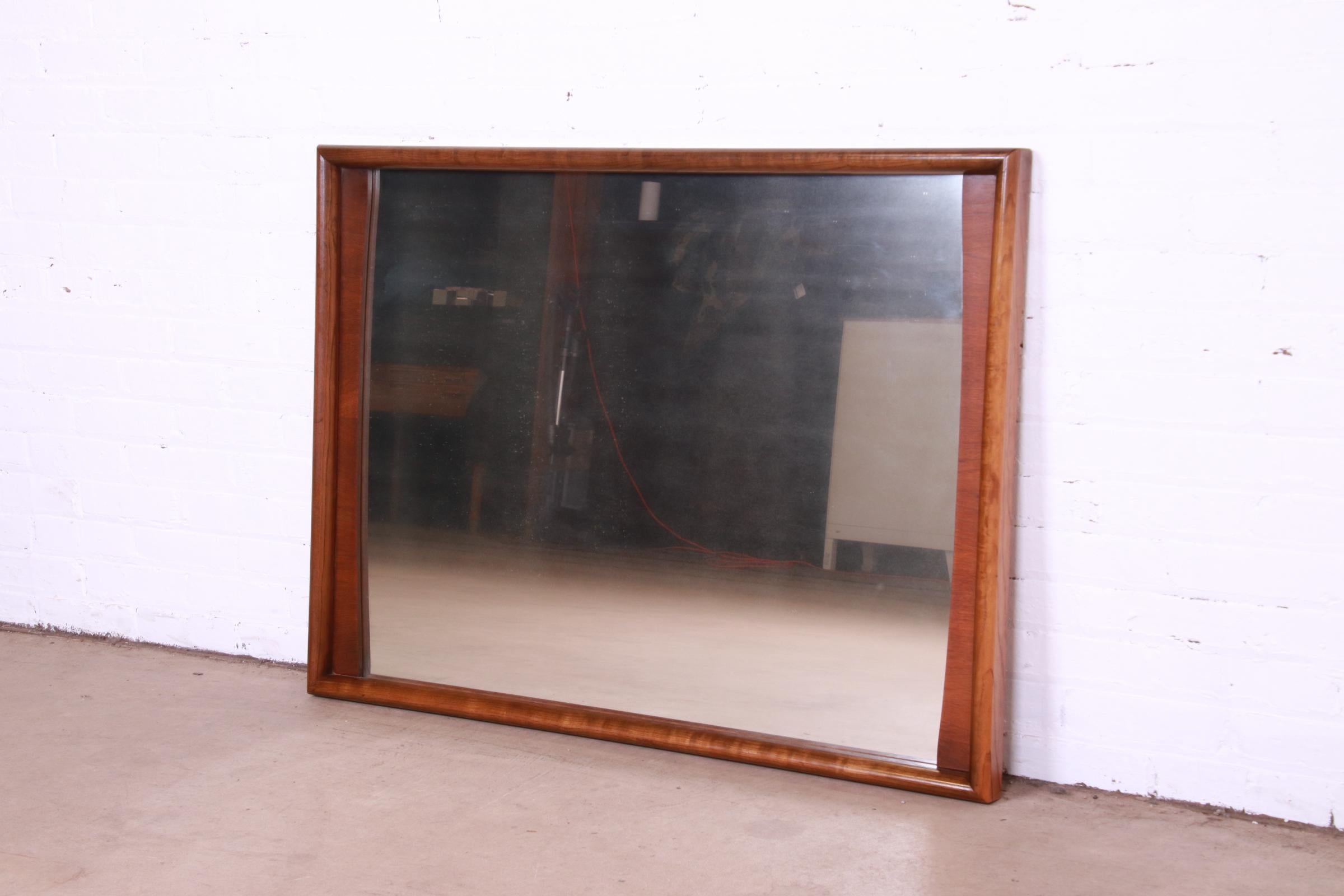 Mid-Century Modern Sculpted Walnut Framed Wall Mirror by United, 1960s In Good Condition In South Bend, IN