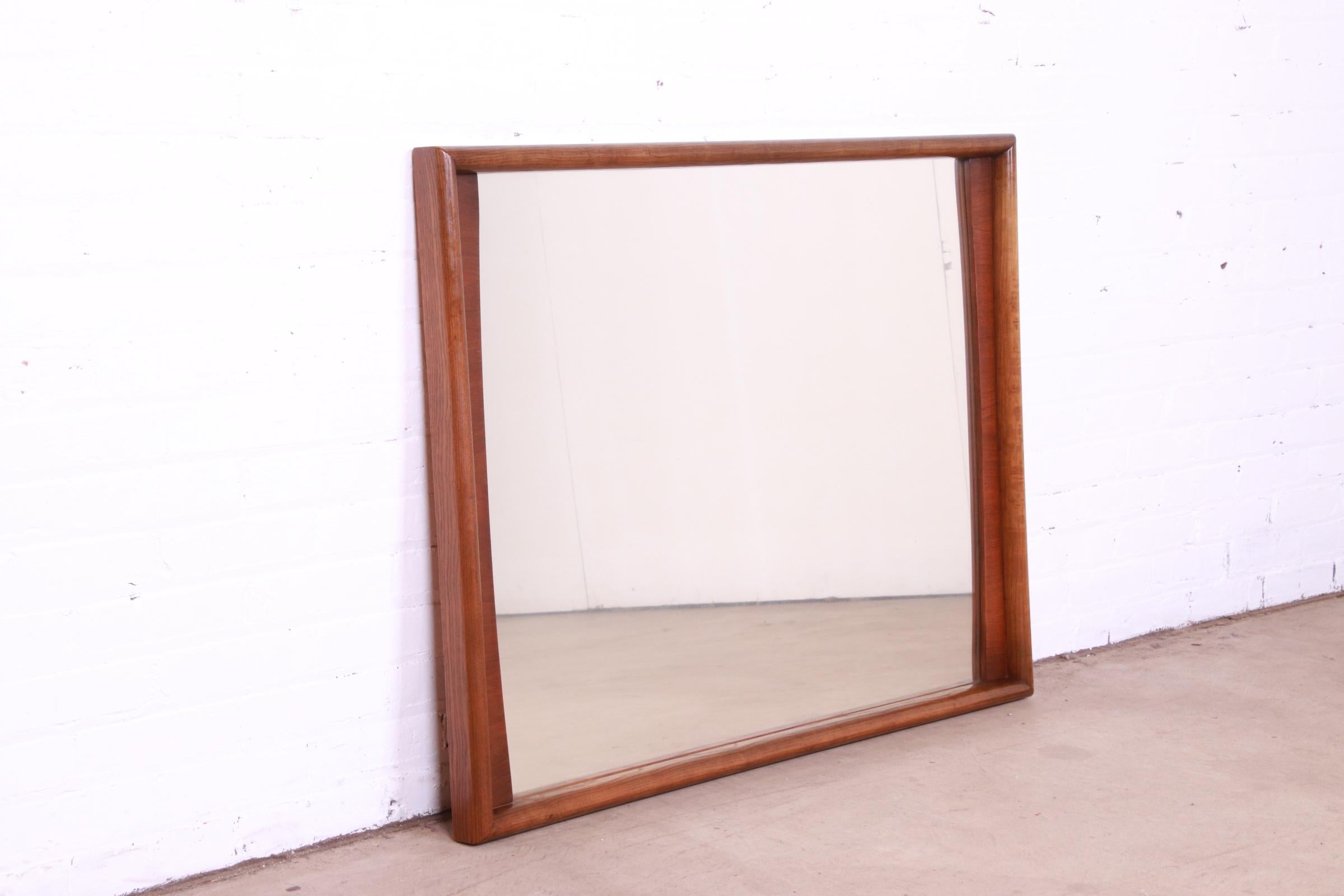 Mid-20th Century Mid-Century Modern Sculpted Walnut Framed Wall Mirror by United, 1960s