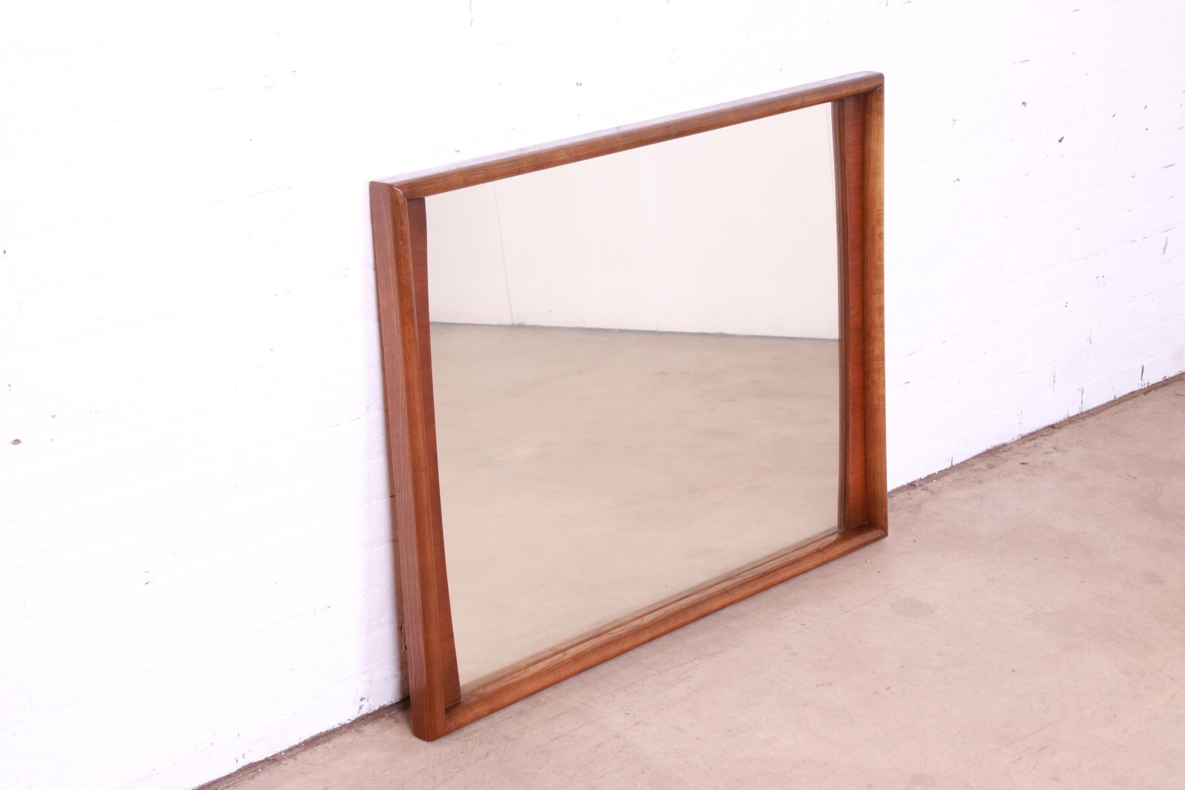 Mid-Century Modern Sculpted Walnut Framed Wall Mirror by United, 1960s 1