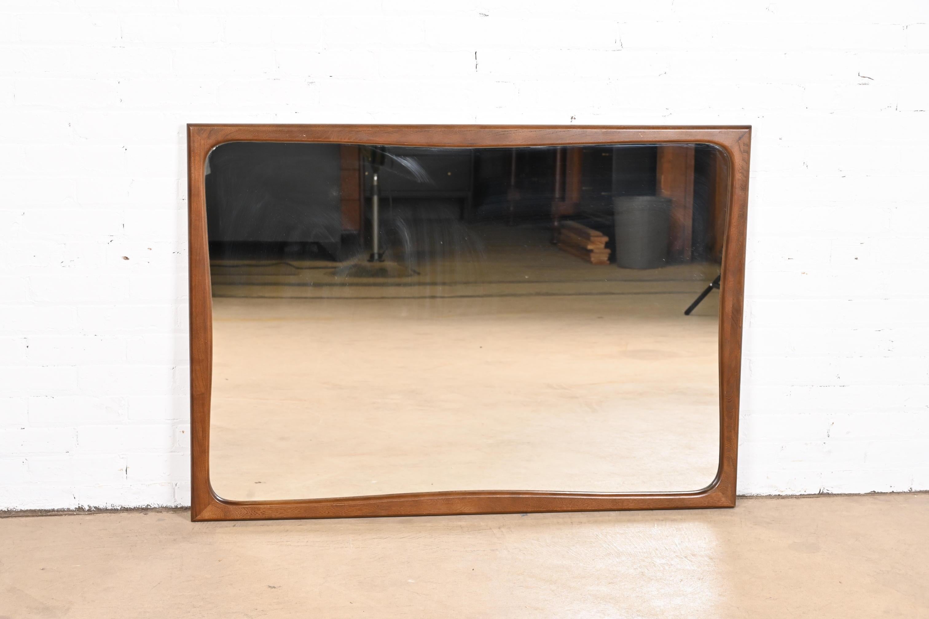 Mid-Century Modern Sculpted Walnut Framed Wall Mirror In Good Condition In South Bend, IN