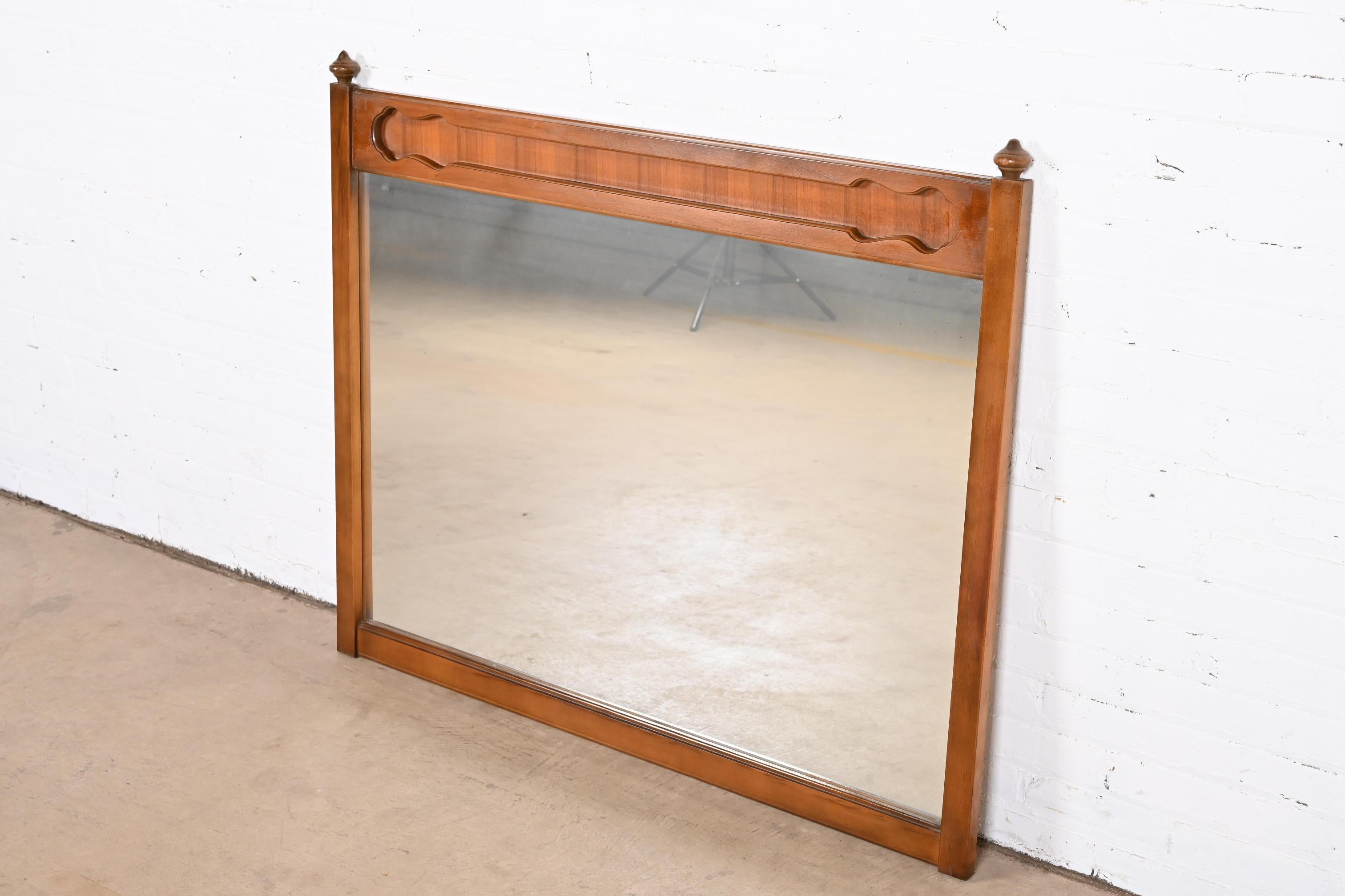 Mid-Century Modern Sculpted Walnut Framed Wall Mirror In Good Condition For Sale In South Bend, IN