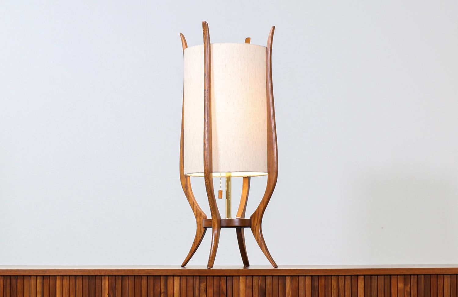 Mid-Century Modern sculpted walnut table lamp by Modeline.