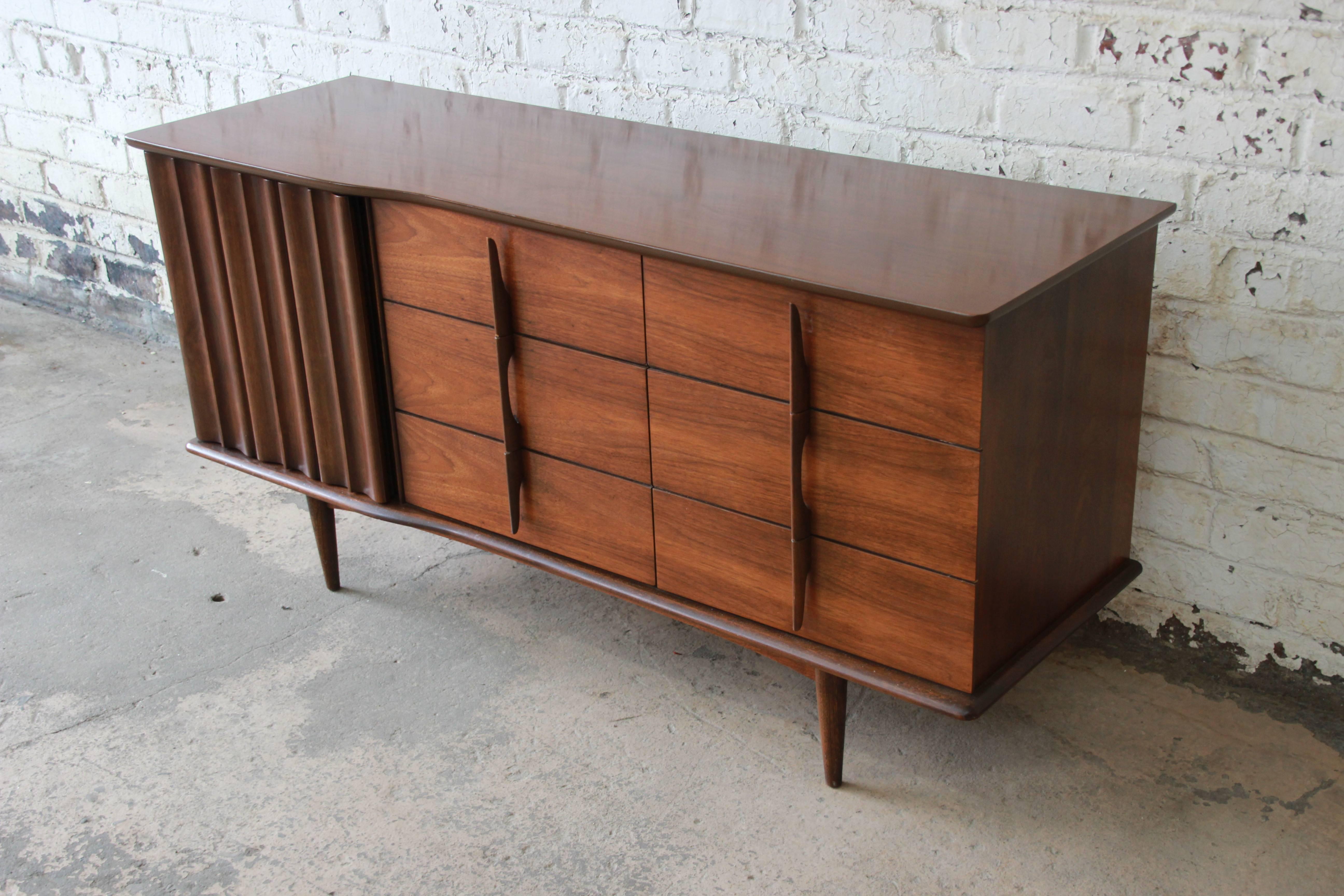 American Mid-Century Modern Sculpted Walnut Triple Dresser or Credenza by United, 1960s