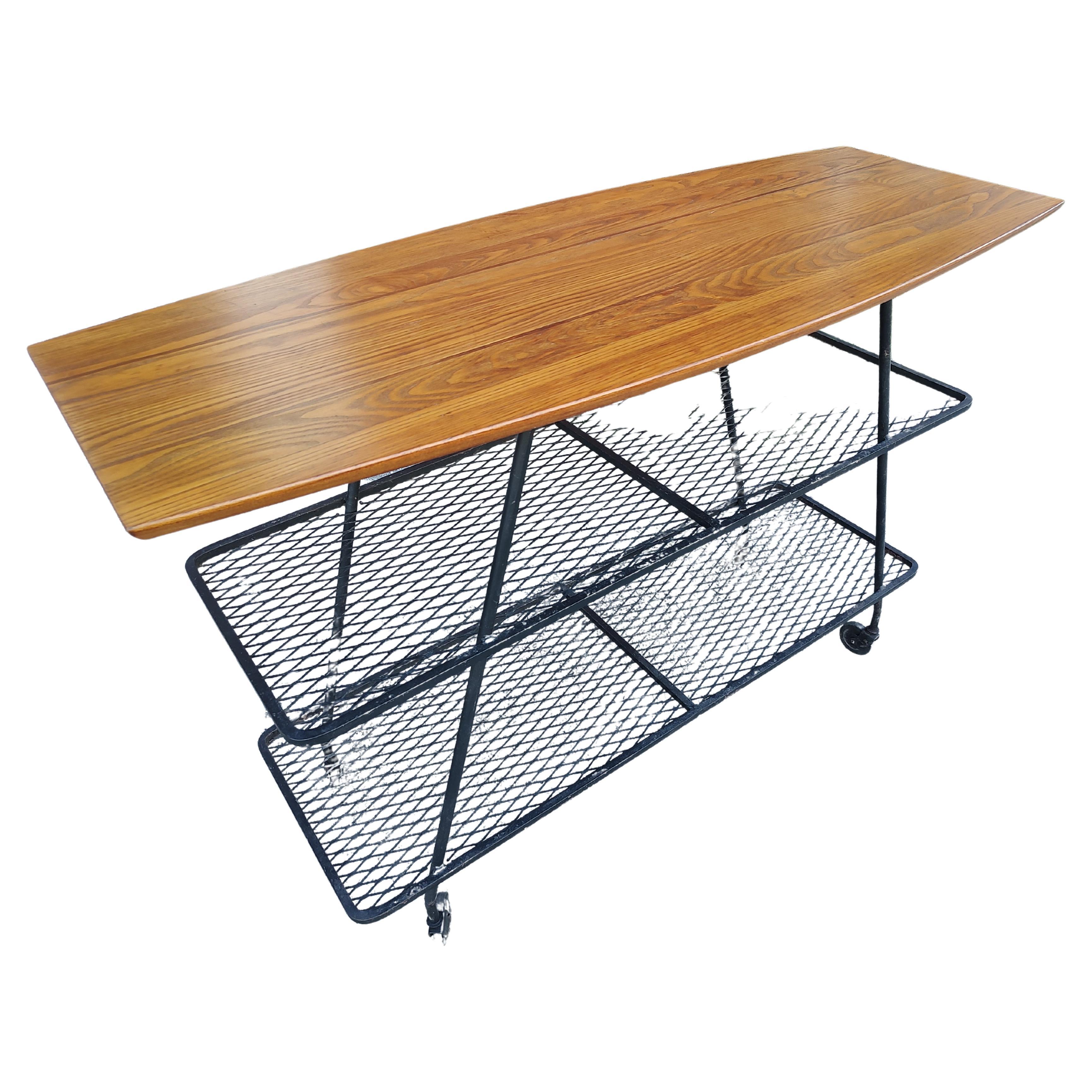 Wrought Iron Mid Century Modern Sculptural Bar Cart with a Surfboard Top by Arthur Umanoff For Sale