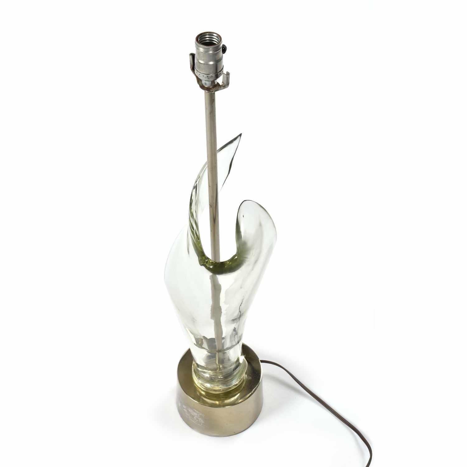 The lamp shade is NOT included with this listing. Please inquire if you would like to purchase the shade separately. 

Elegant Mid-Century Modern sculptural Murano glass table lamp. The piece is unmarked but its of high quality in terms of design