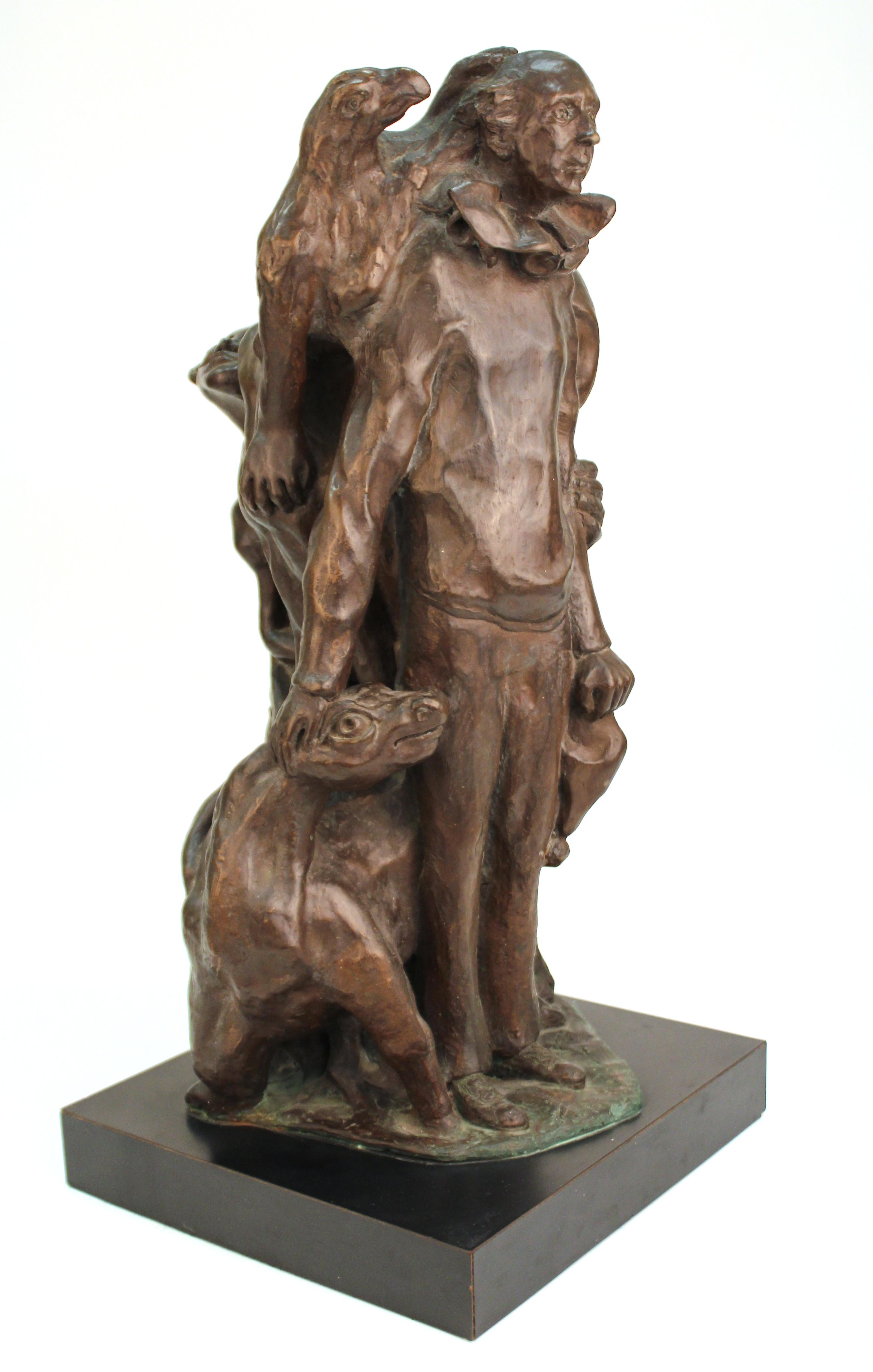 Mid-Century Modern sculpted group of a standing clown surrounded by animals and mystical creatures. The piece is made in bronzed terracotta and sits atop a black base. The piece is marked illegibly with a monogram on the base and on the top of the