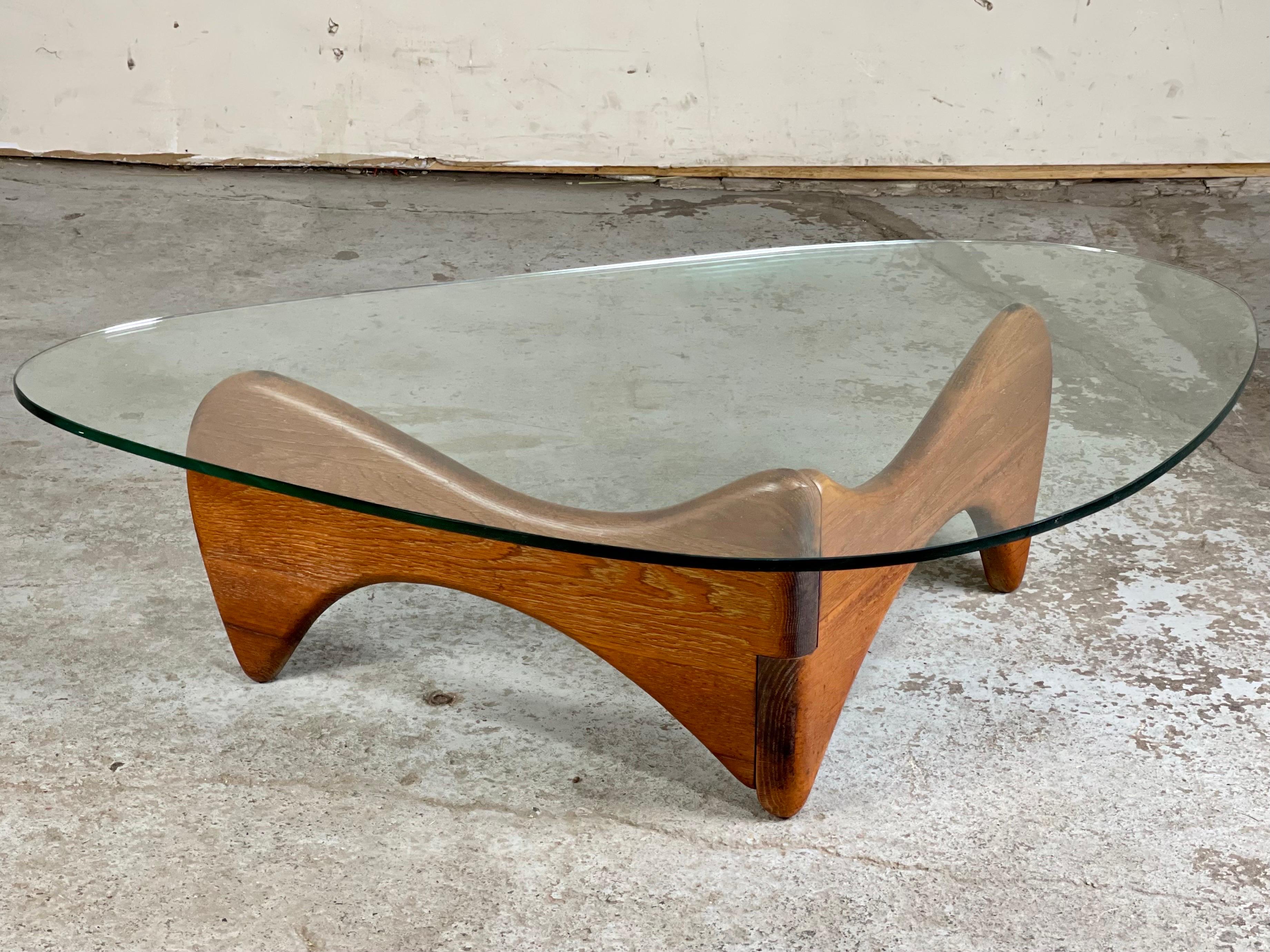 Excellent studio made sculptural solid teak coffee table drenched with a blanket of rich patina - after Isamu Noguchi. There are different forms by this maker and I have yet to see any credible attribution. Whomever it was - did great work. The