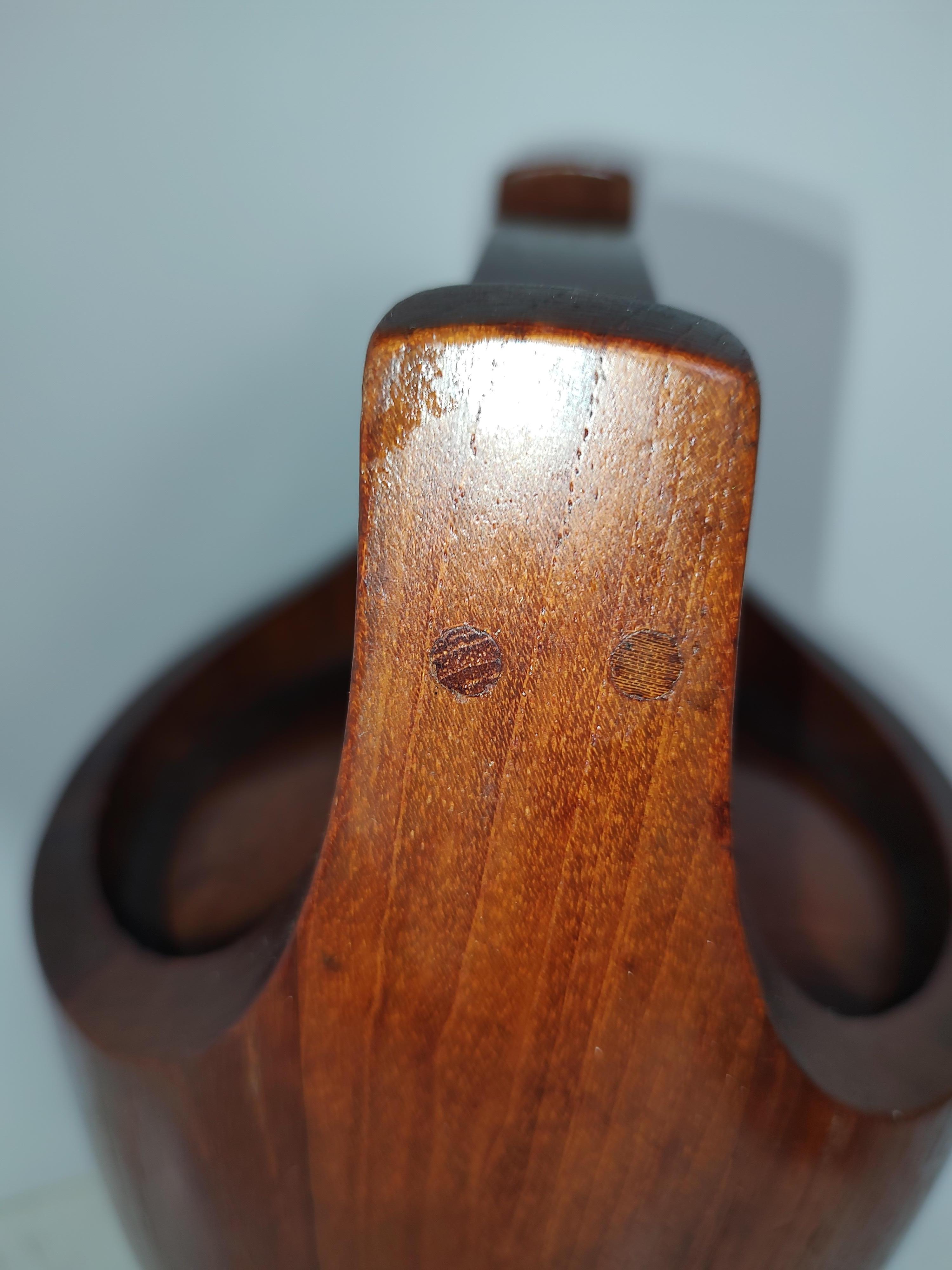 Sculptural teak ice bucket with a plastic liner by Jen's Quistgaard for Dansk. In excellent vintage condition with minimal wear. Can be parcel posted.