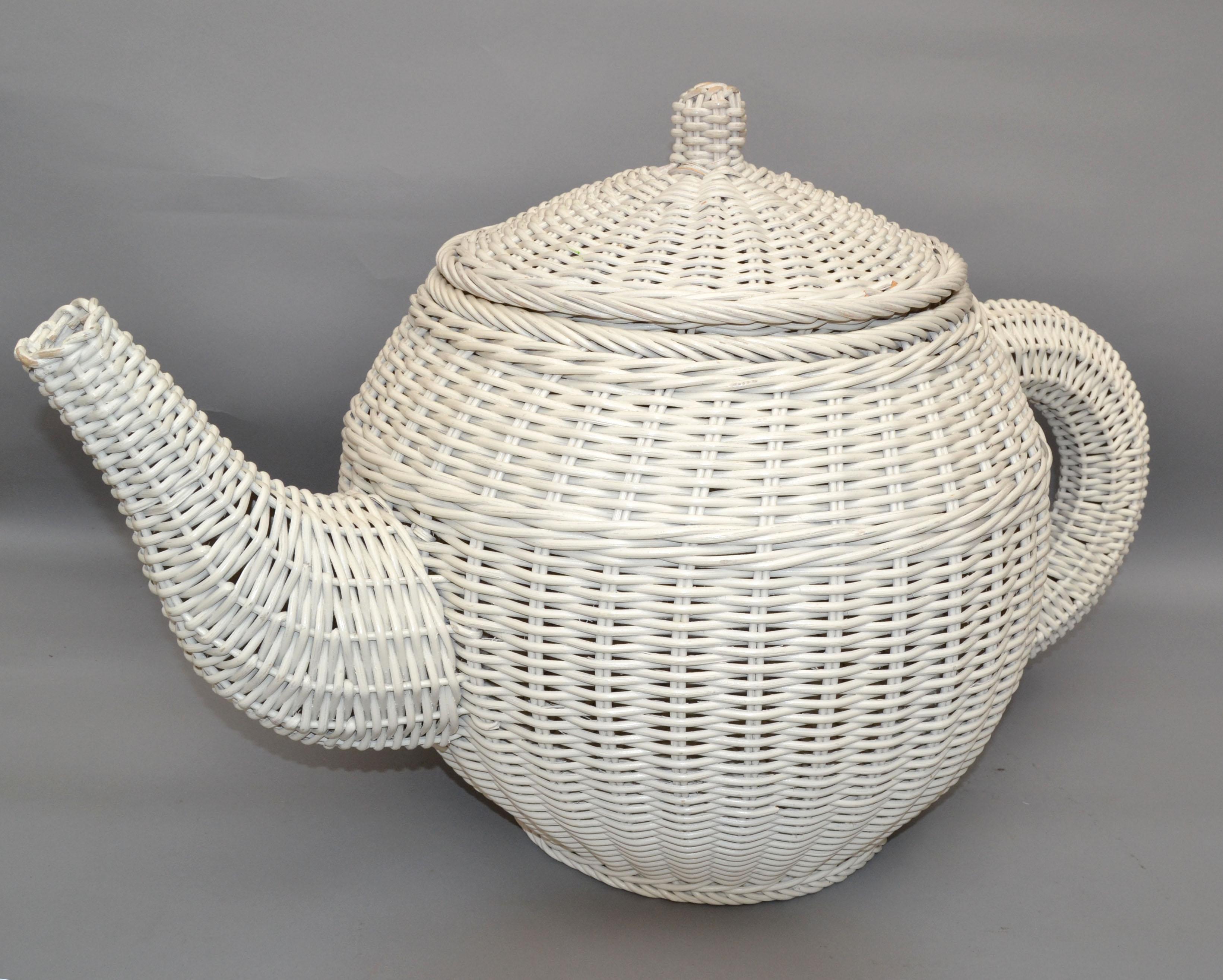Mid-Century Modern handmade & hand woven white finished wicker, rattan & cane sculpted coffee or tea pot with lid.
Great as toy storage container or for a coffee sShop display.
All original condition with some minor breaks around the Lid knob to