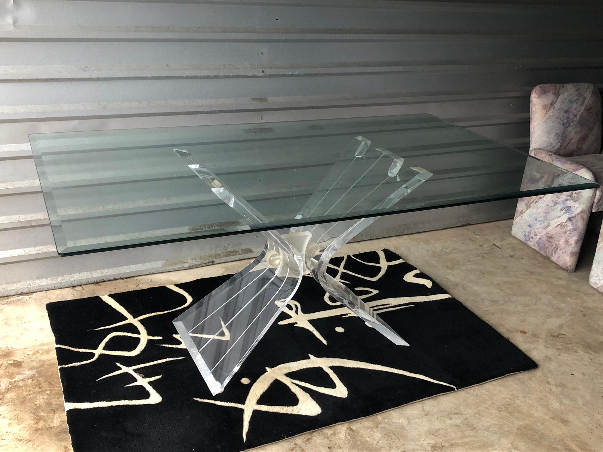 Classic Butterfly Lucite dining table. Lucite base with 3/8”beveled glass in excellent condition. Attributed to Lion in Frost.