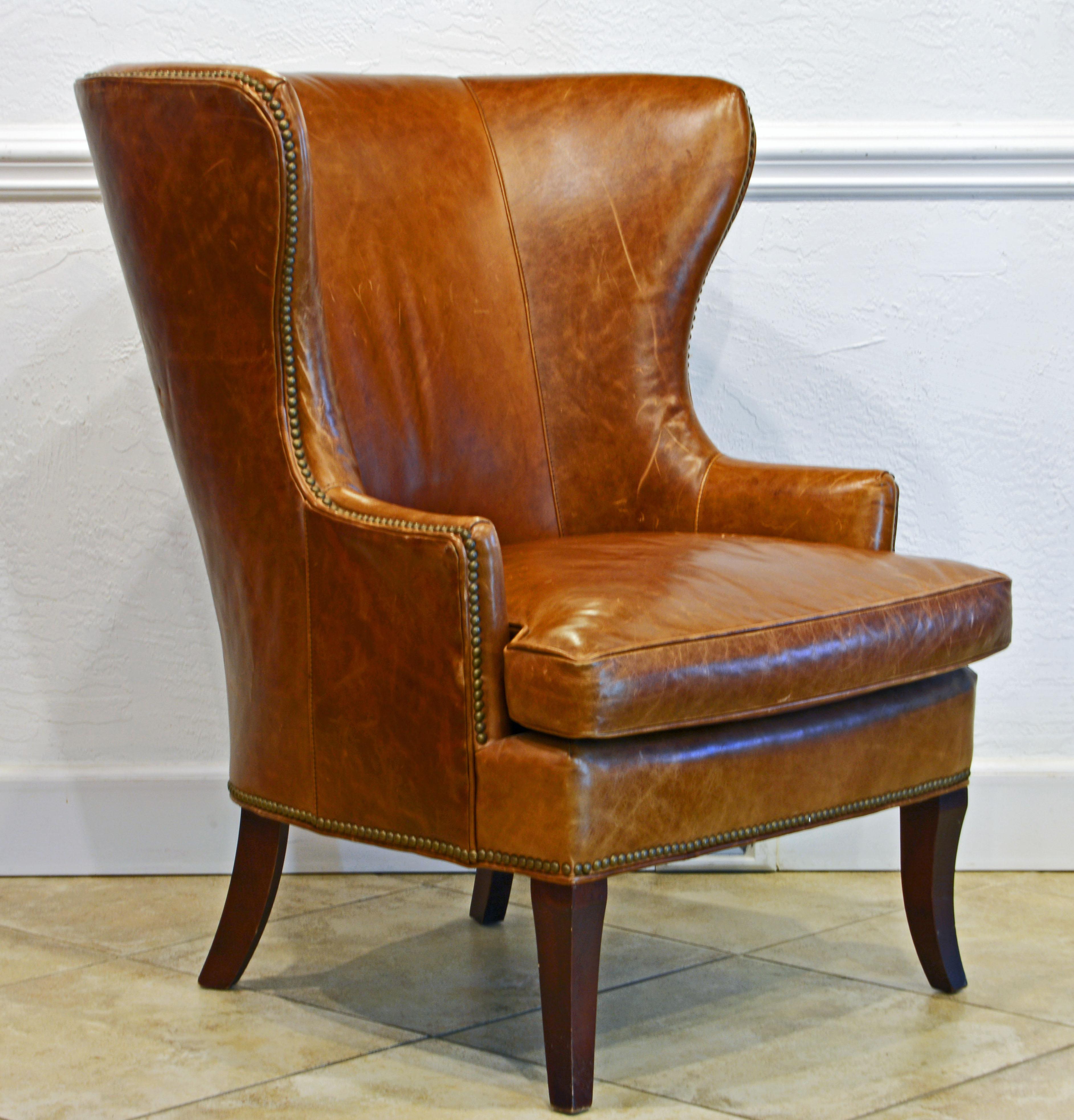 American Mid-Century Modern Sculptural Nail Head Trimmed Tanned Leather Wing Chair