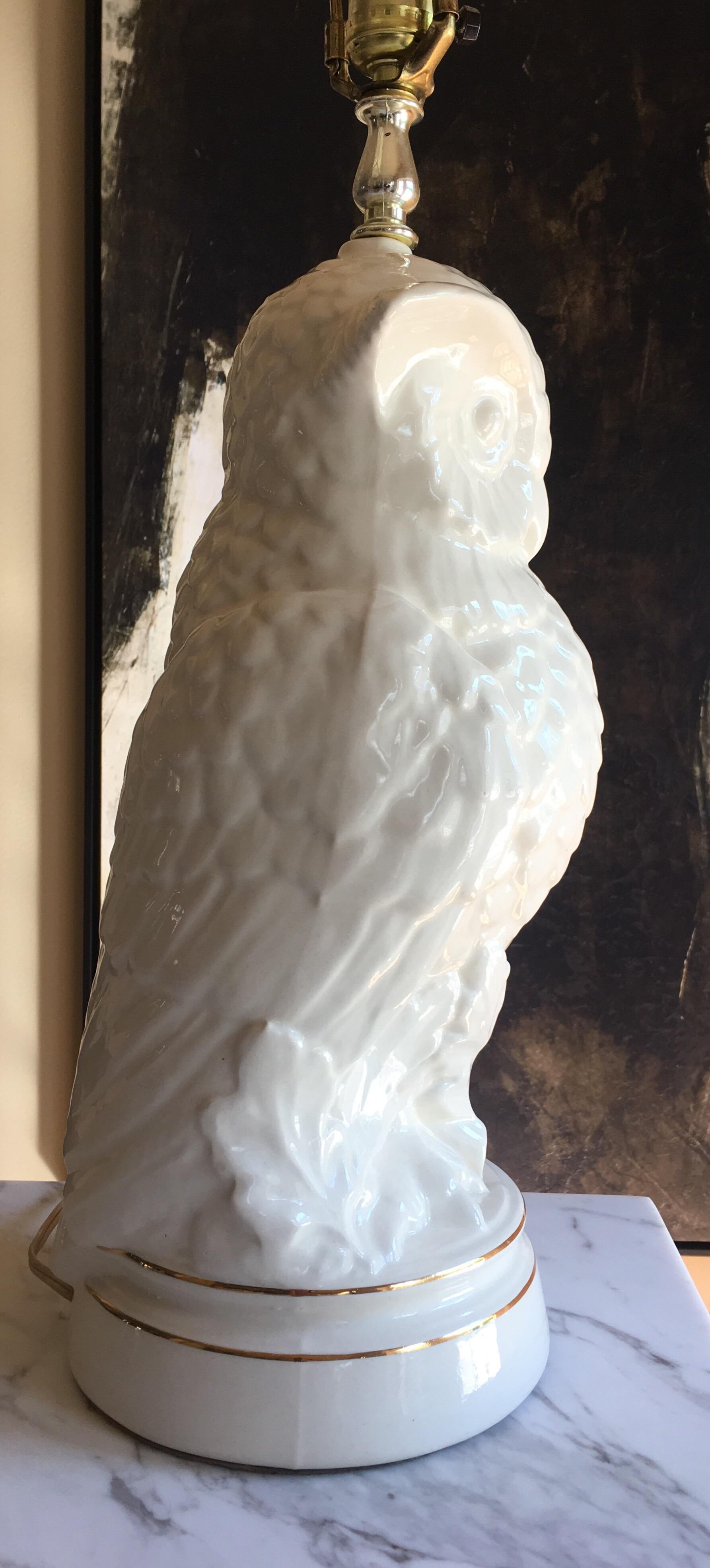 Mid-Century Modern white/cream glazed ceramic owl bird table lamp with gold band detailing. Lamp shade not included.
