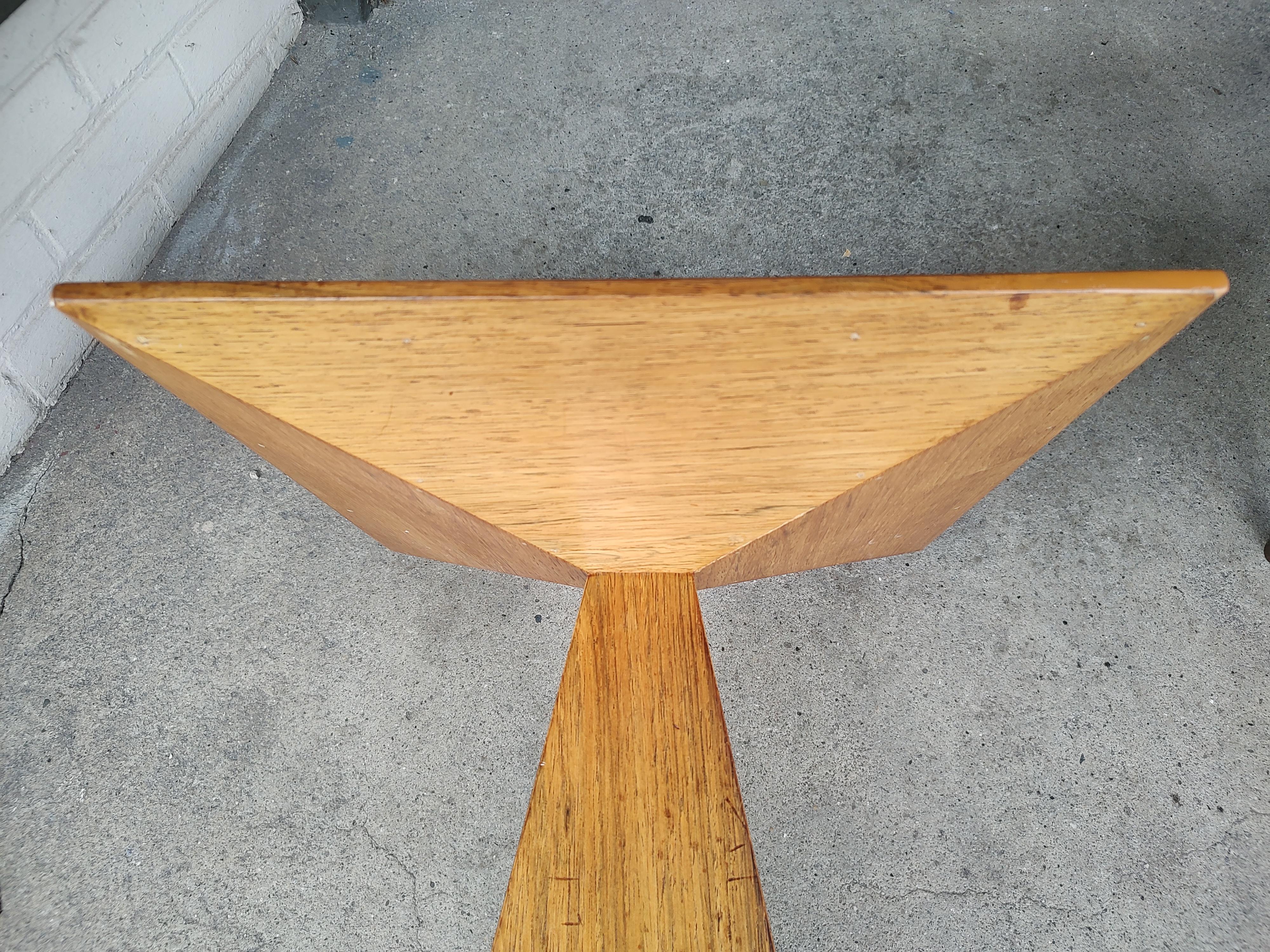 Rare hard to find table in the form of a pyramid base with a quartered top in wenge wood. Spectacular design. In excellent vintage condition with minimal wear. Can be parcel posted.
