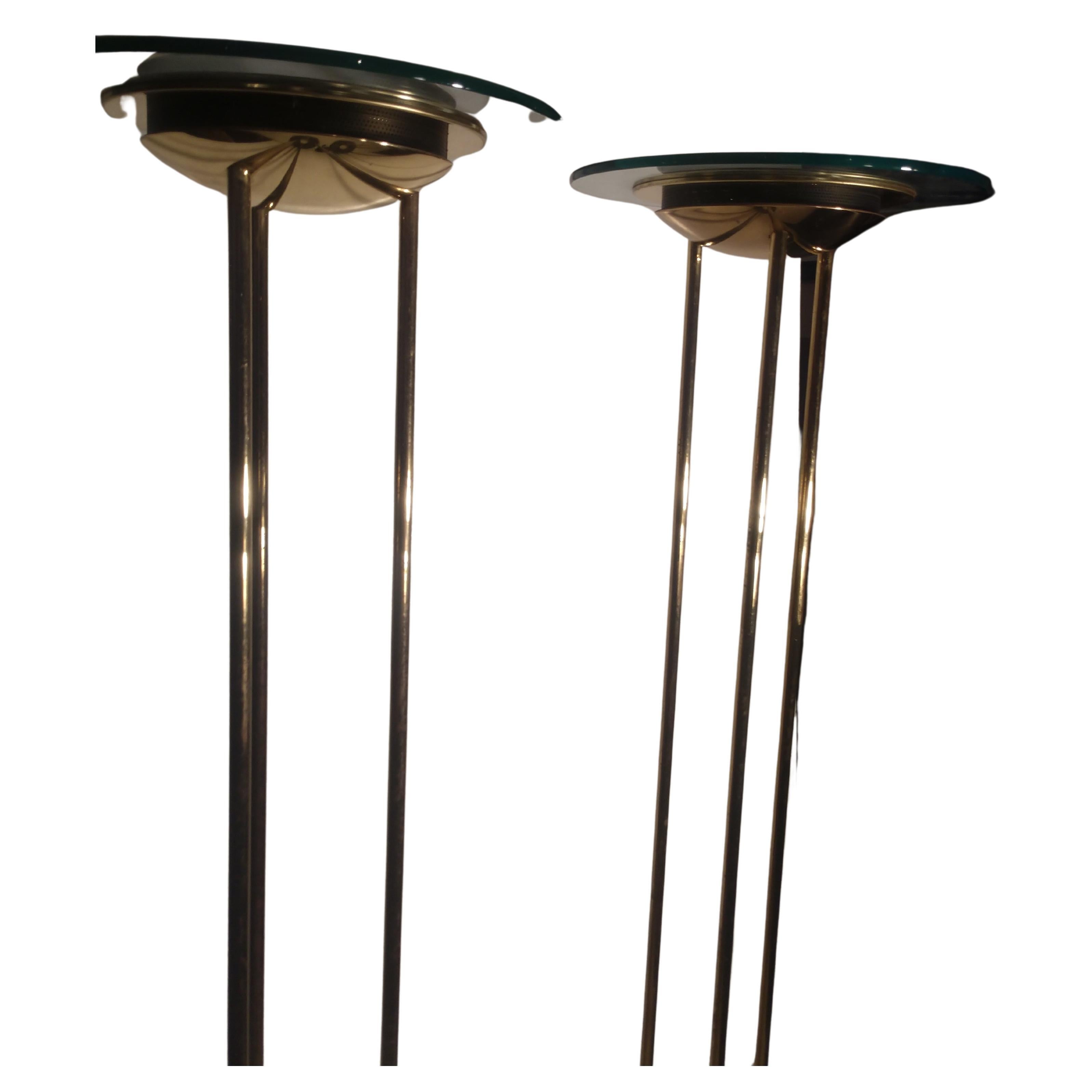 Fabulous pair of tall elegant torchiers. Designed by Richard Sonneman for Kovacs. In excellent vintage condition with minimal wear. Glass and marble are perfect. Brass has discoloration.