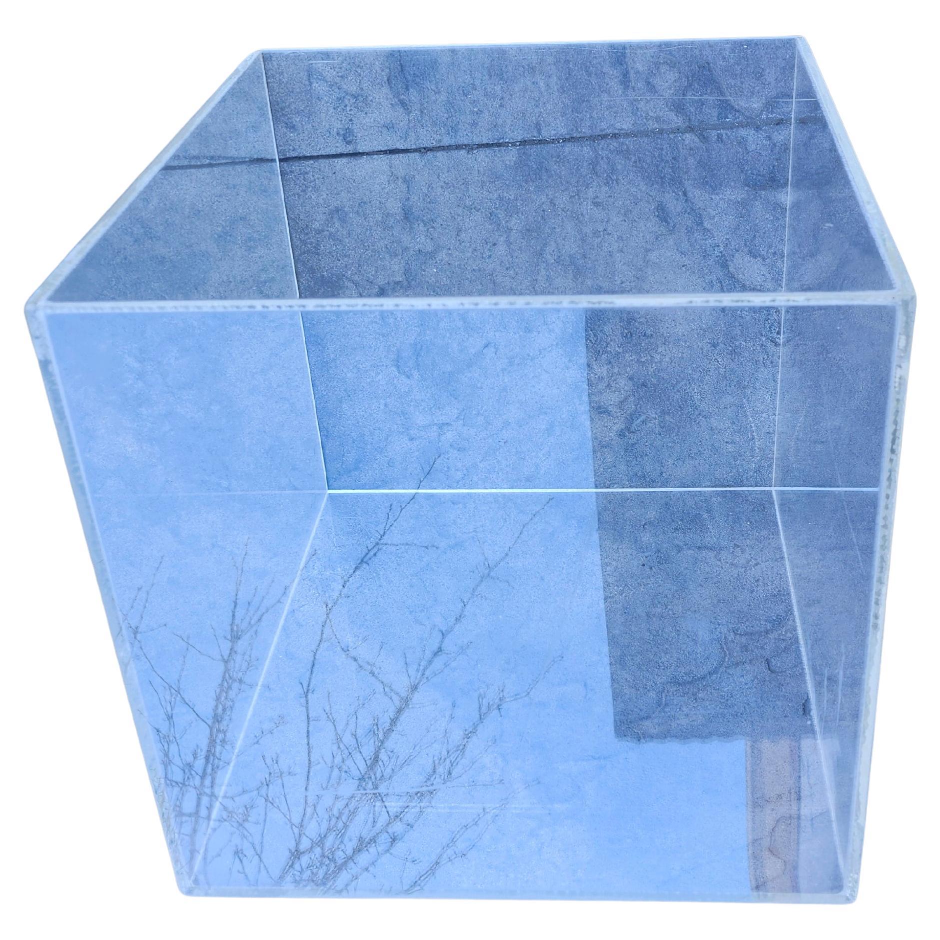 Fantastic clear square 16 inch plexiglass box with a textured black slate top. Fabulous combination, its simplicity is beautiful and very durable and functional.  Unnoticed slught mars , very minor otherwise its perfect.