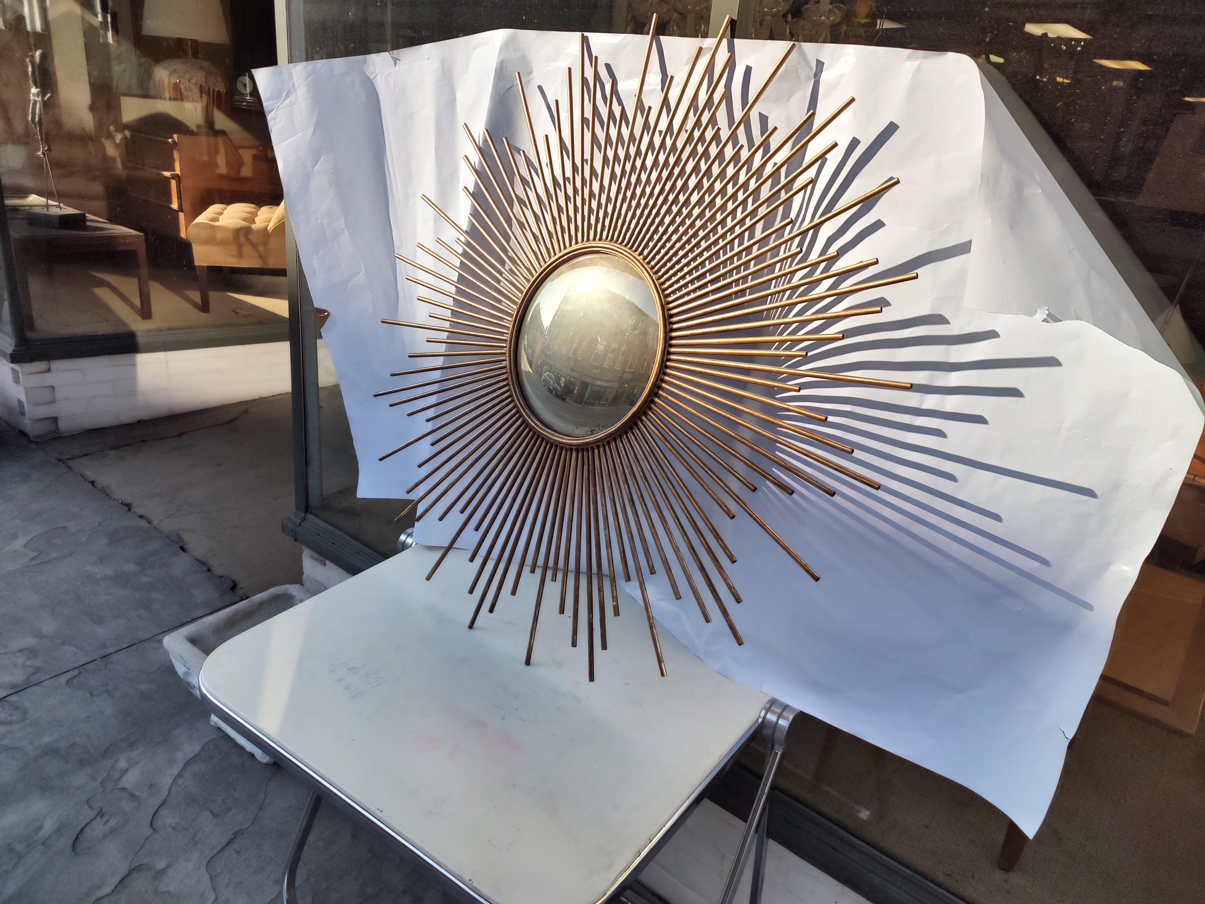 Hollywood Regency Mid-Century Modern Gilt Metal Sculptural Sunburst Mirror C1965 For Sale